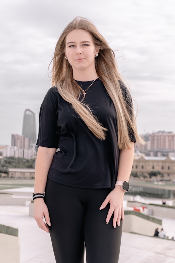 Young woman with long blonde hair outdoors