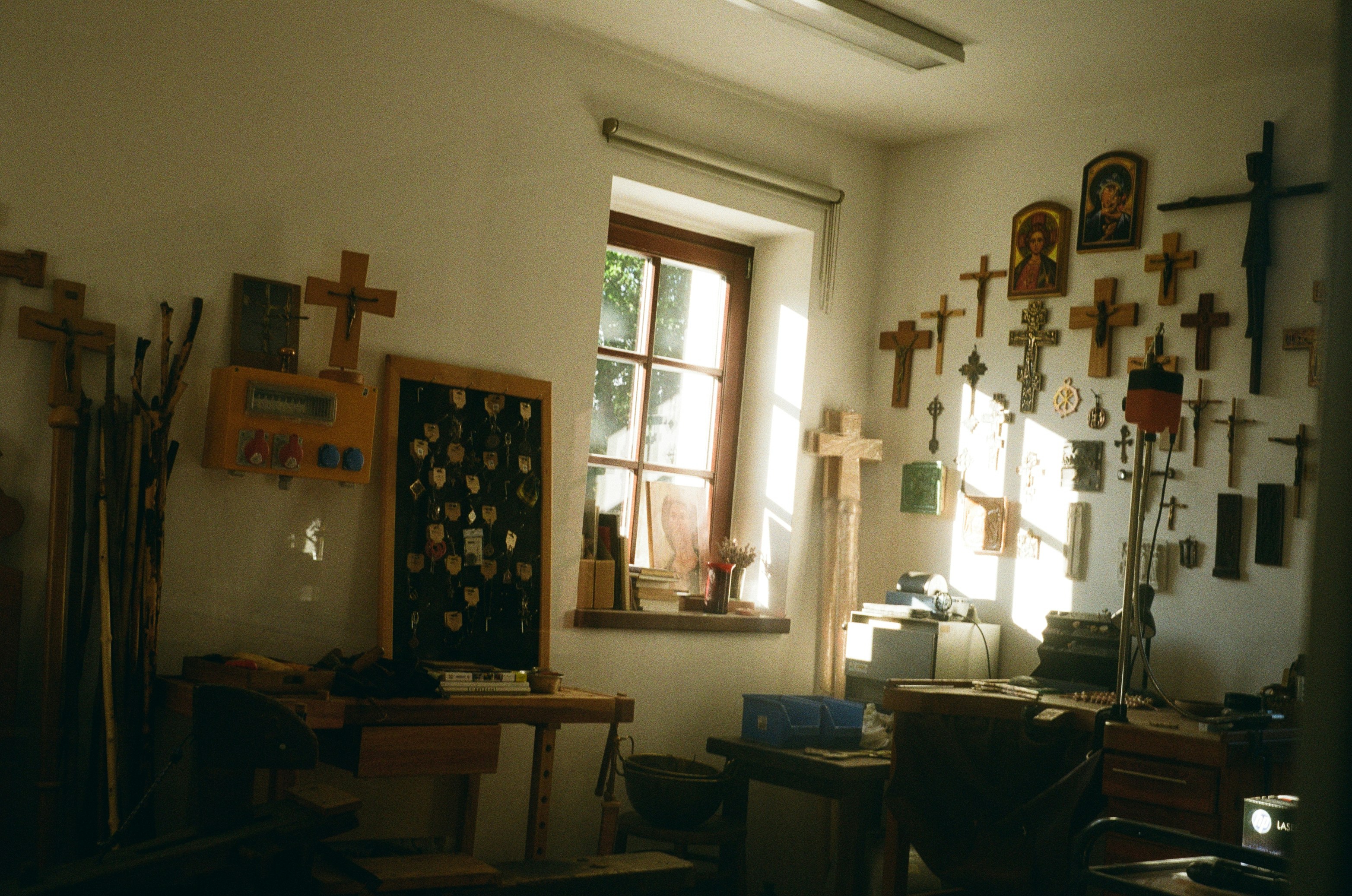 Workshop filled with many wooden crosses
