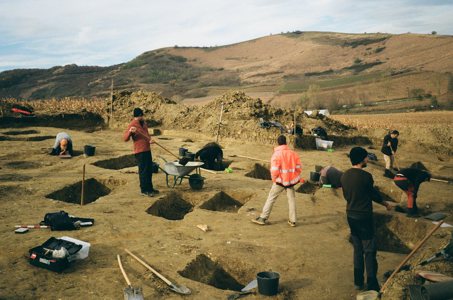 Archaeologists excavating a historical site