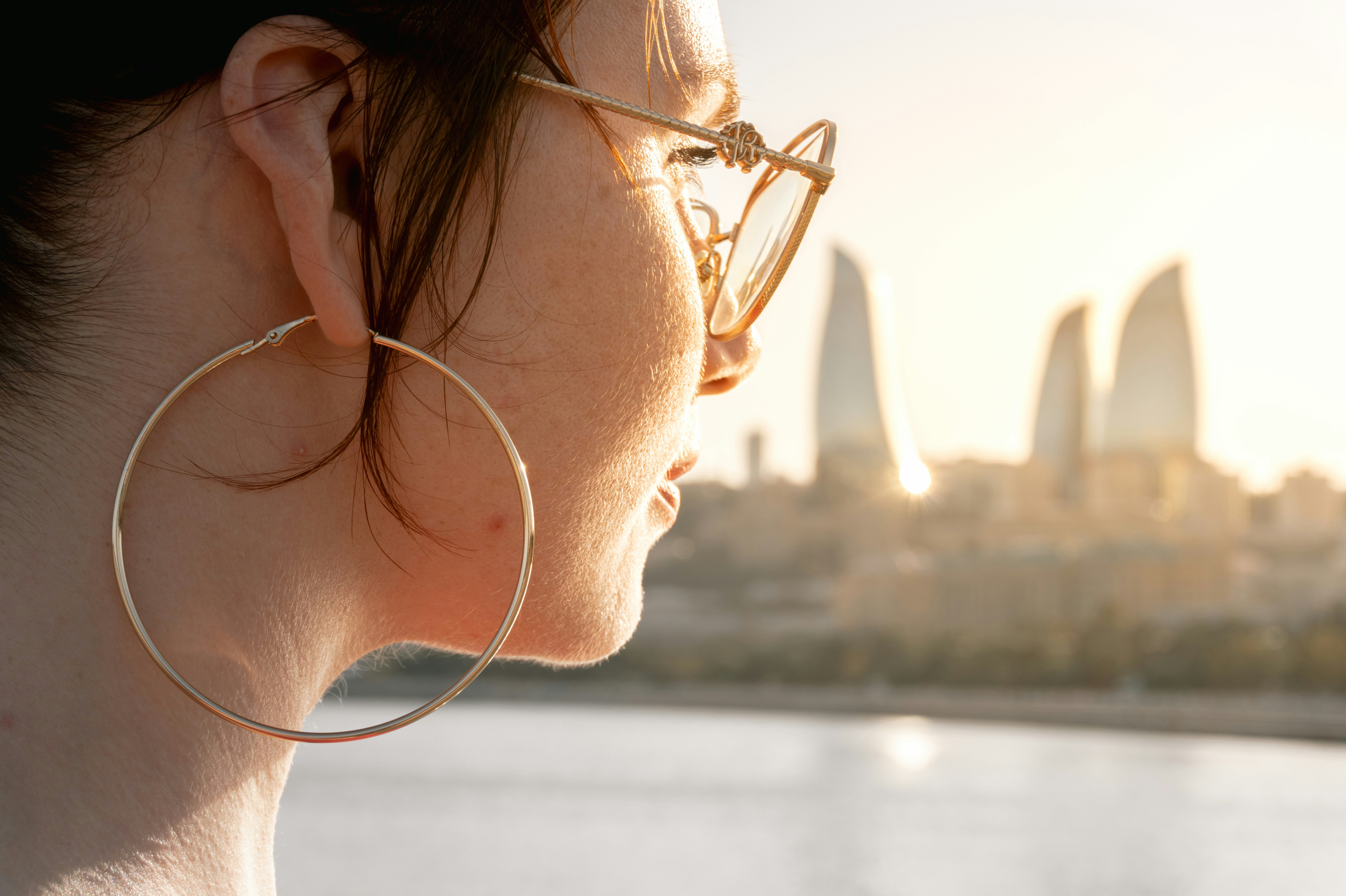 A guide to hoop earring sizes on the ear from huggies to statement sizes