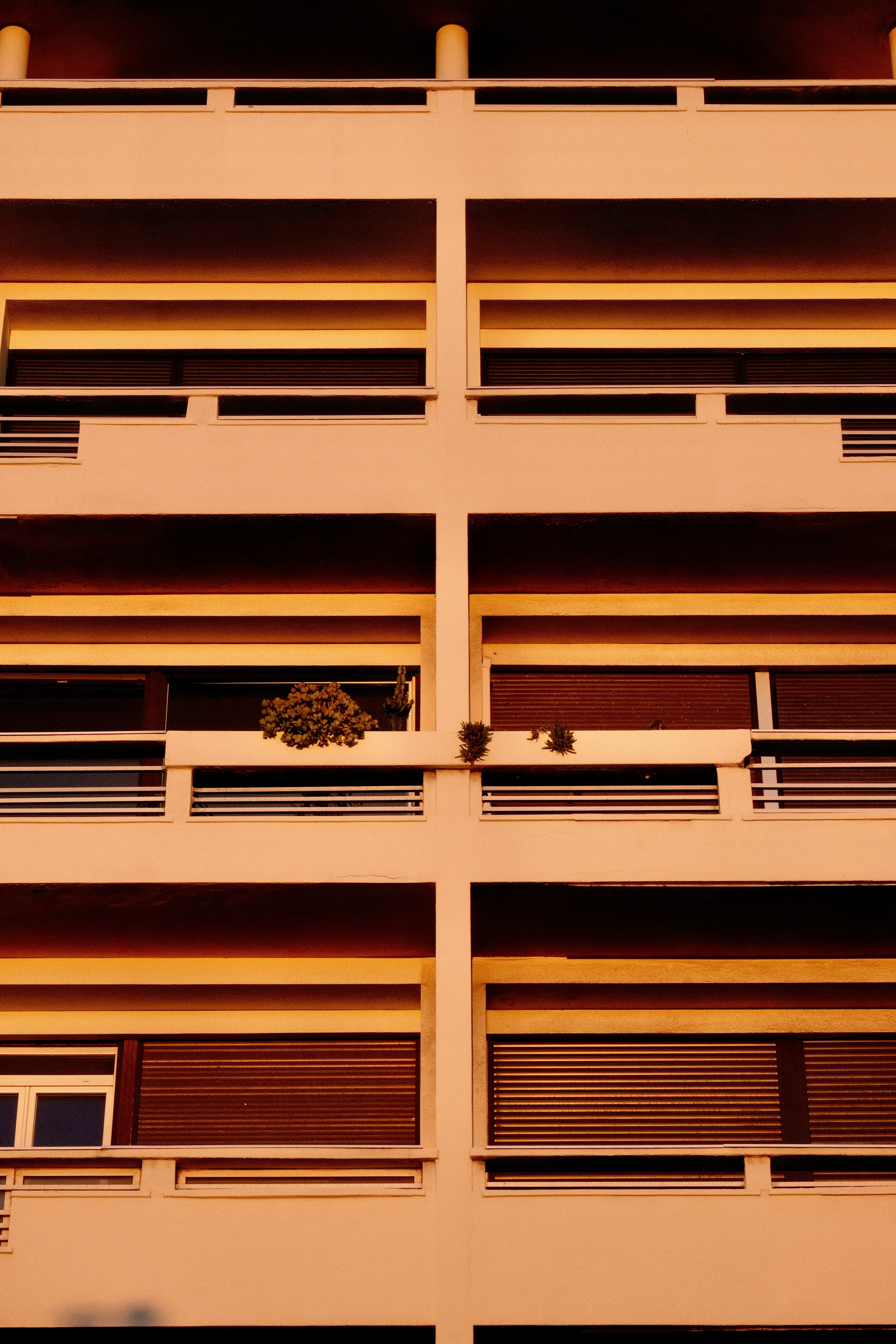 Modern building facade with balconies and windows