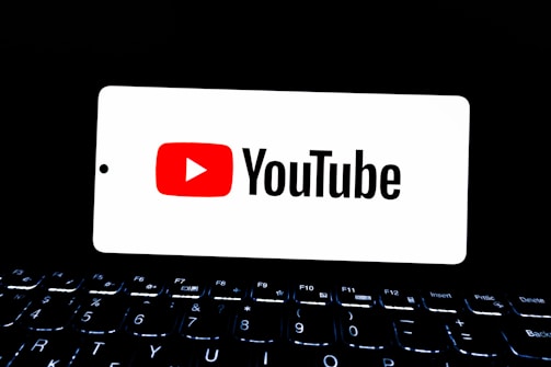 Youtube logo displayed on a smartphone screen.