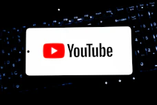 Youtube logo displayed on a smartphone screen.