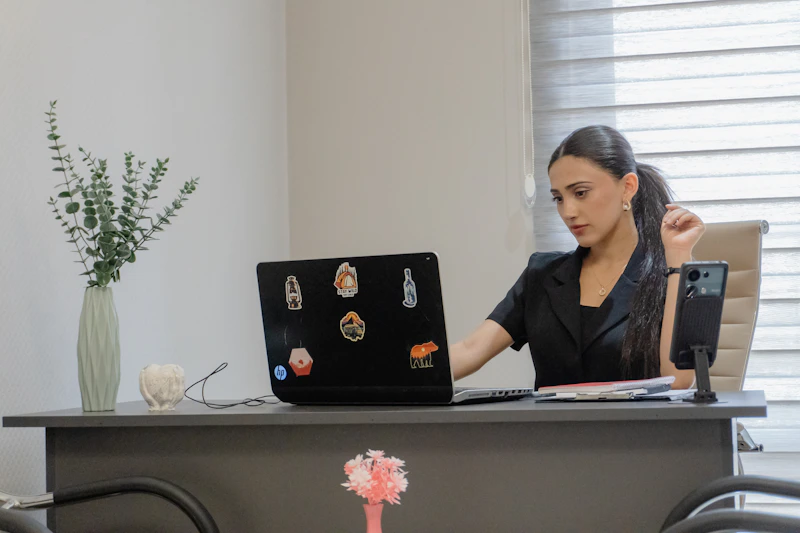 Affiliate marketer optimizing website on laptop