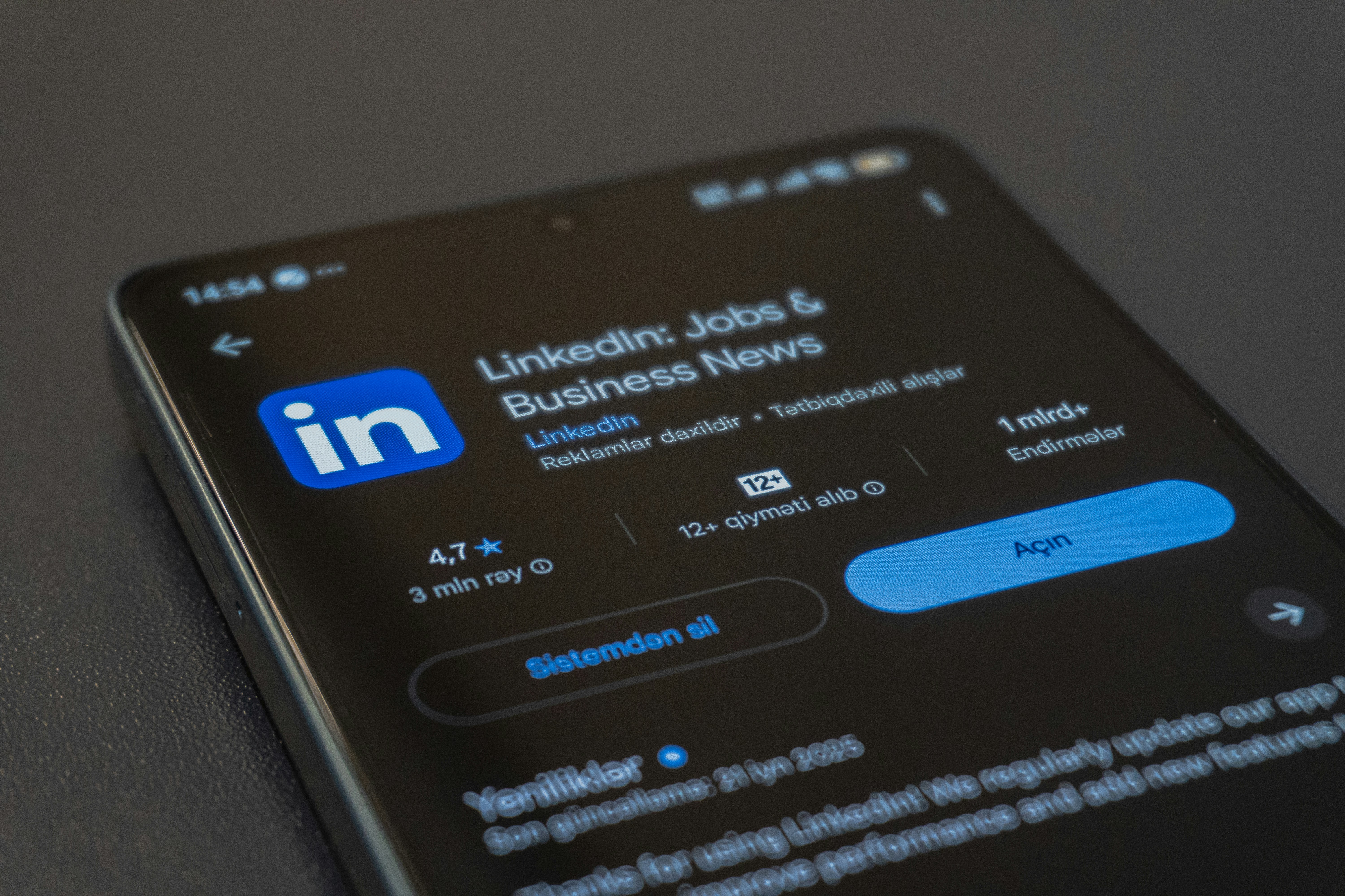 Smartphone screen displaying linkedin app details.