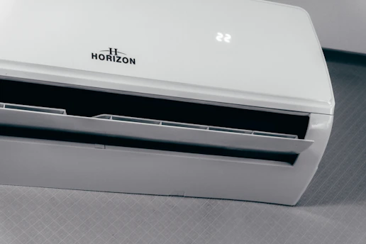 White air conditioner unit displaying 22 degrees