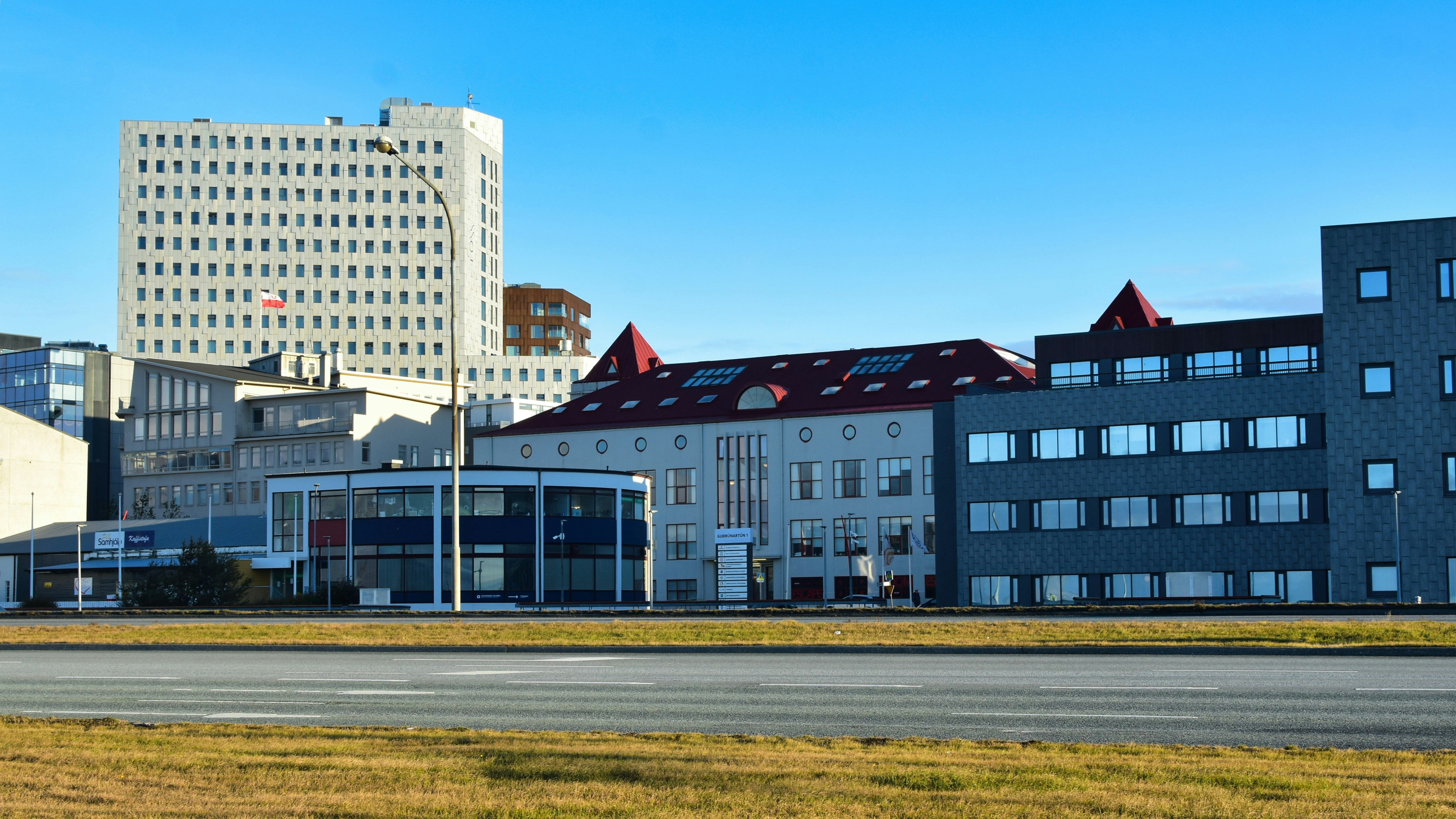 Modern buildings under a clear blue sky