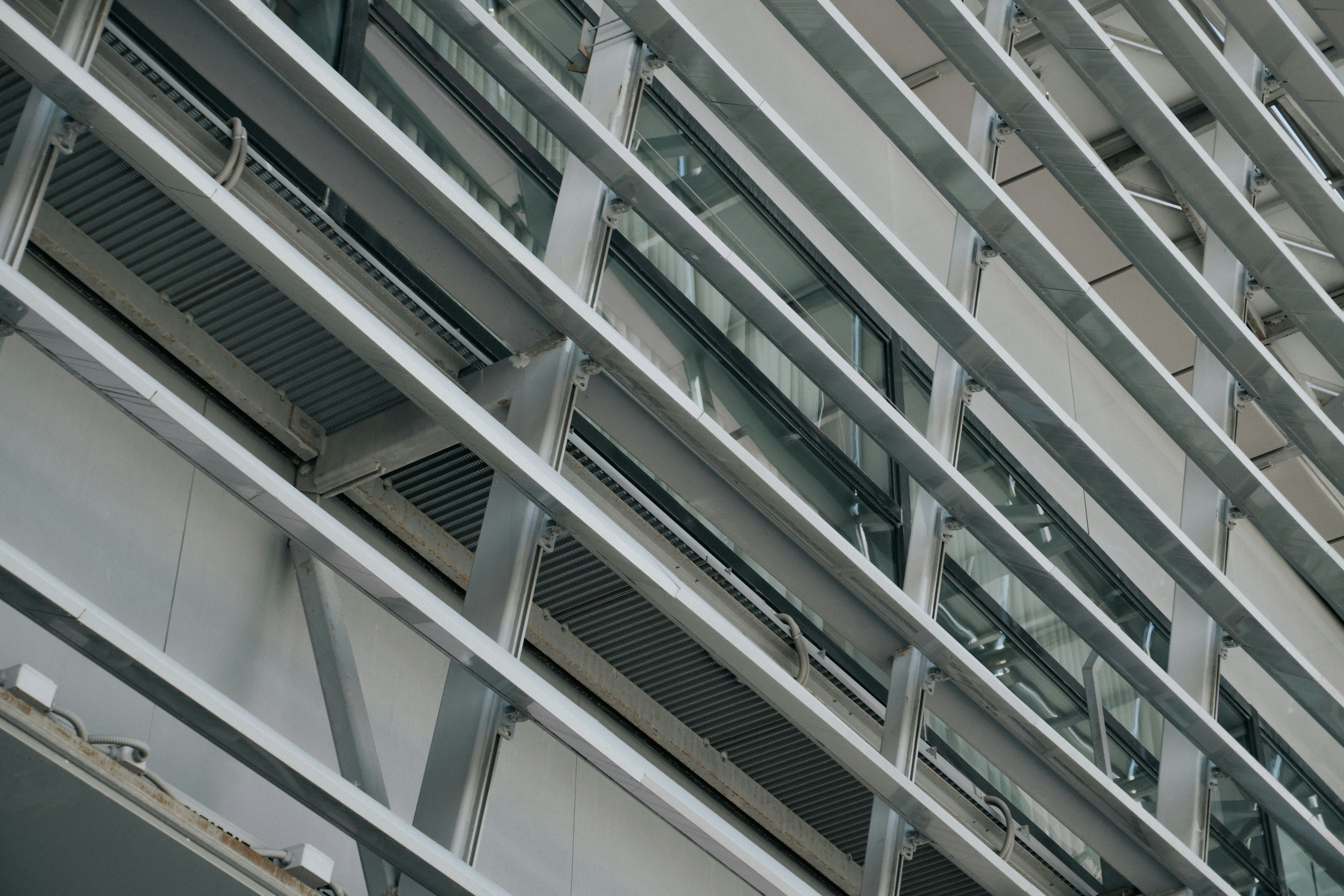 Modern building facade with metal beams and glass windows