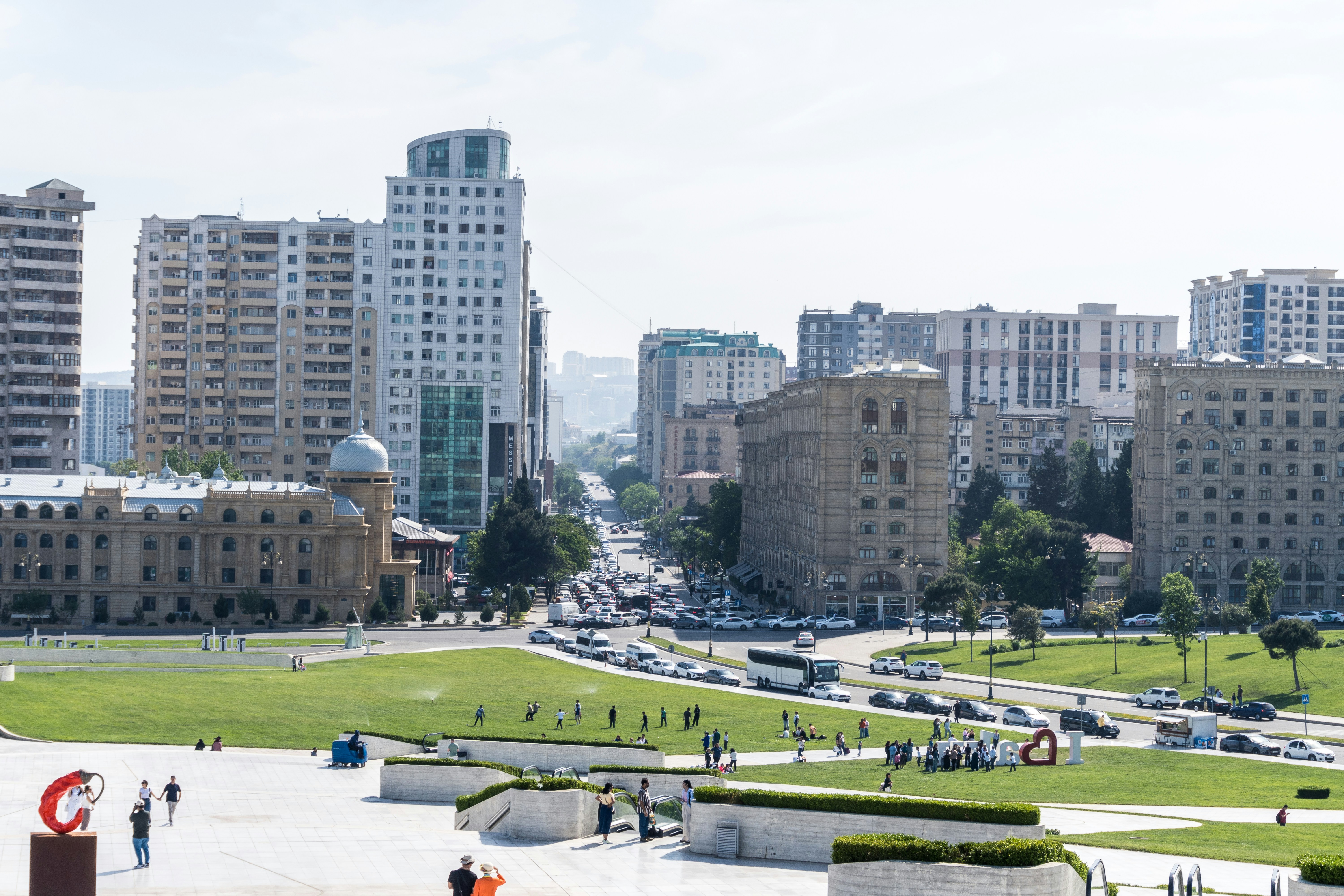 city park with modern architecture - sustainable urban living