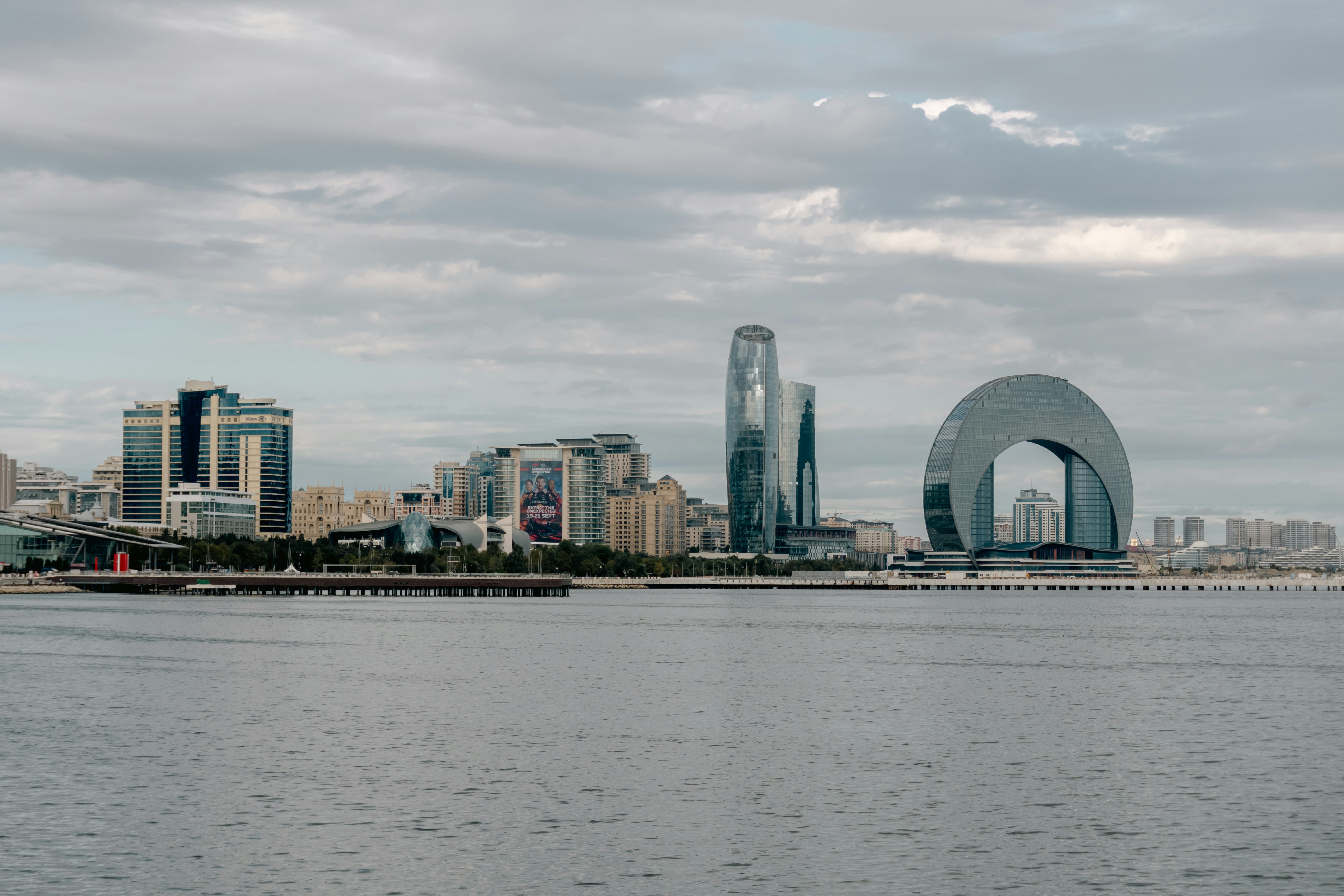 Modern cityscape with unique architecture on the waterfront.