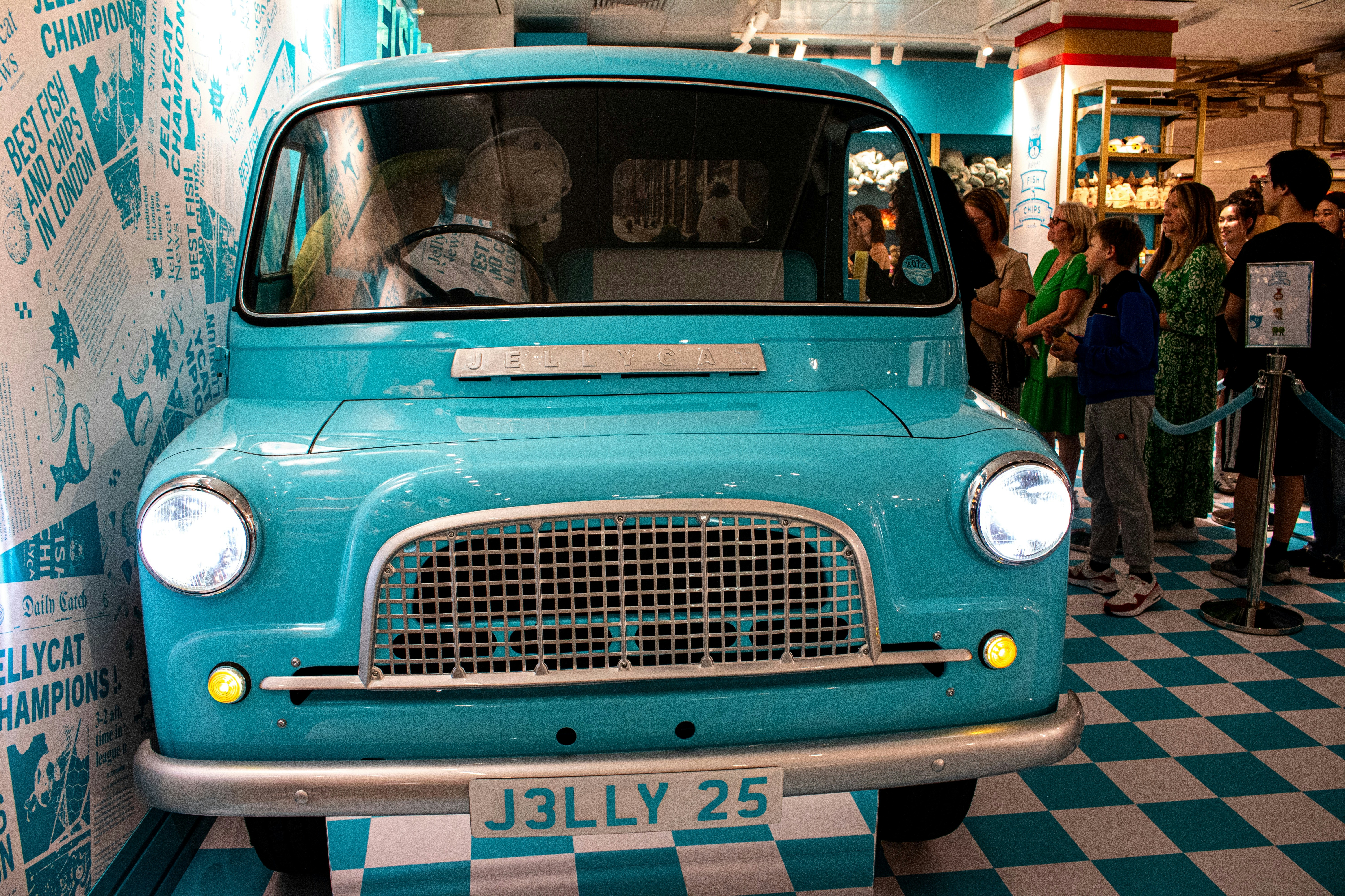 A vintage turquoise van with a checkered floor photo – Free Toy store ...