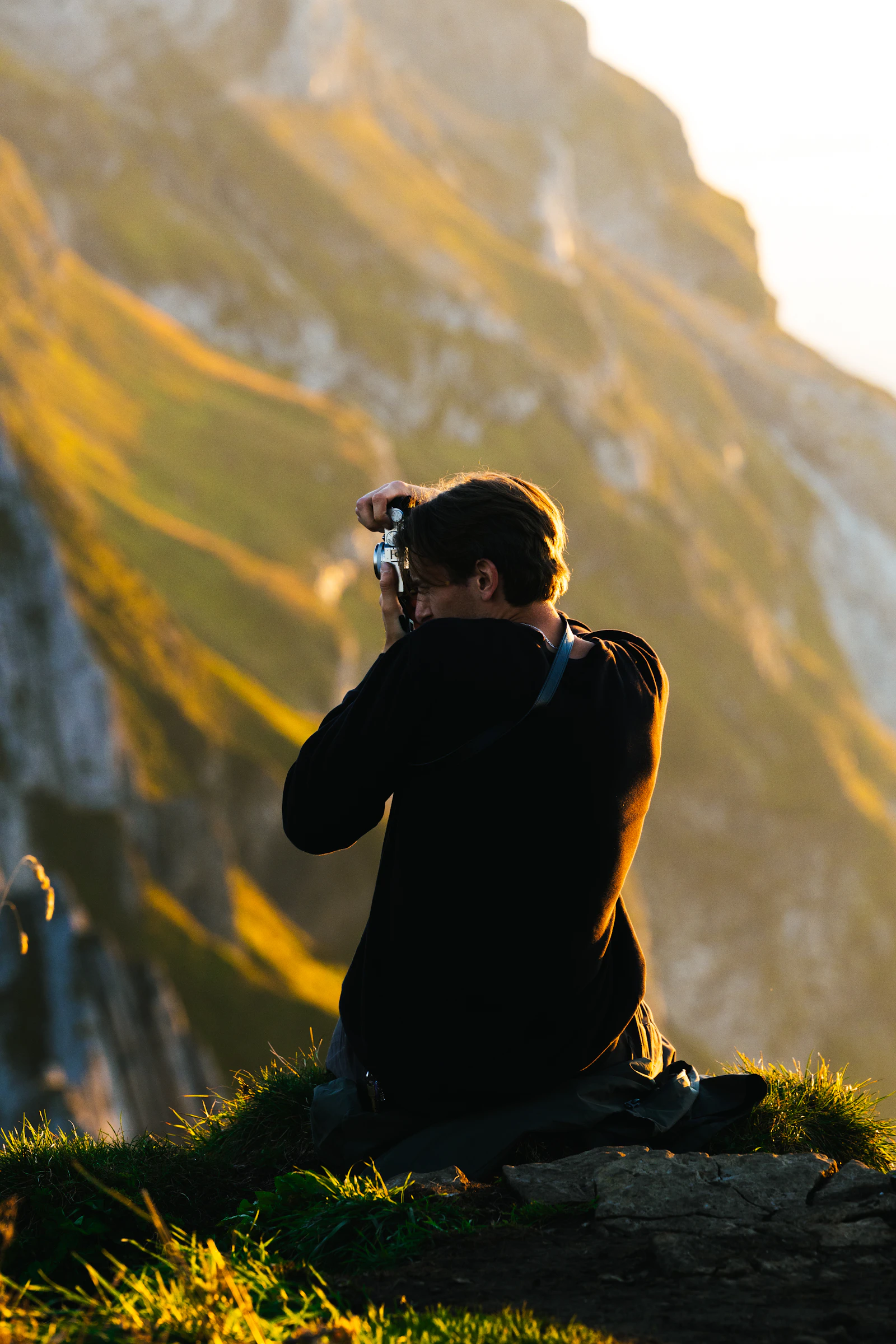 Photographer capturing a landscape in cinematic light