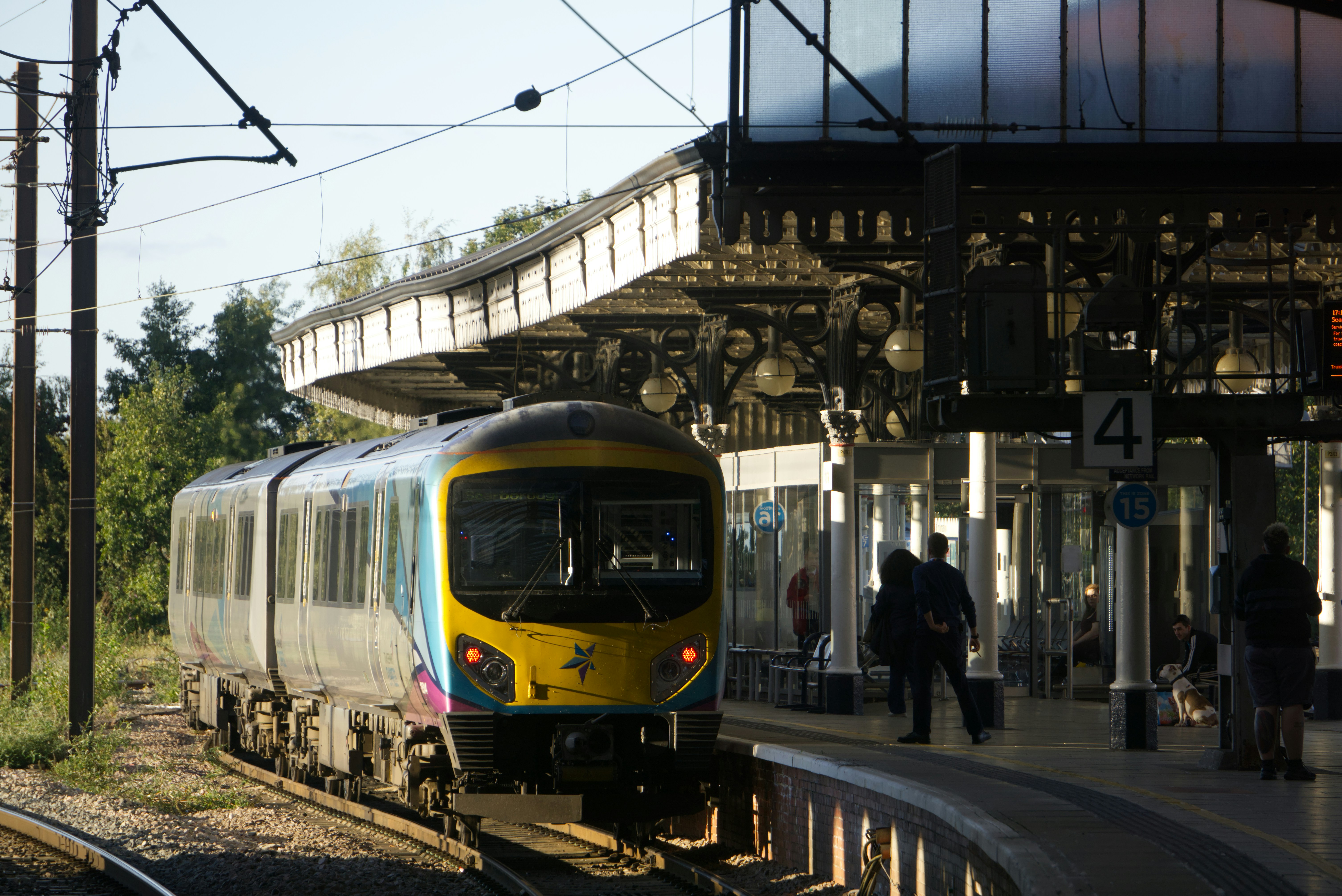 A train arriving at a station platform.
