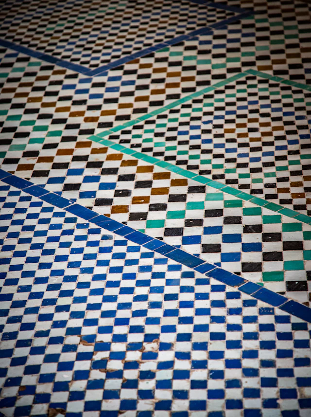 Geometric zellige mosaic tiles in blue, white and green