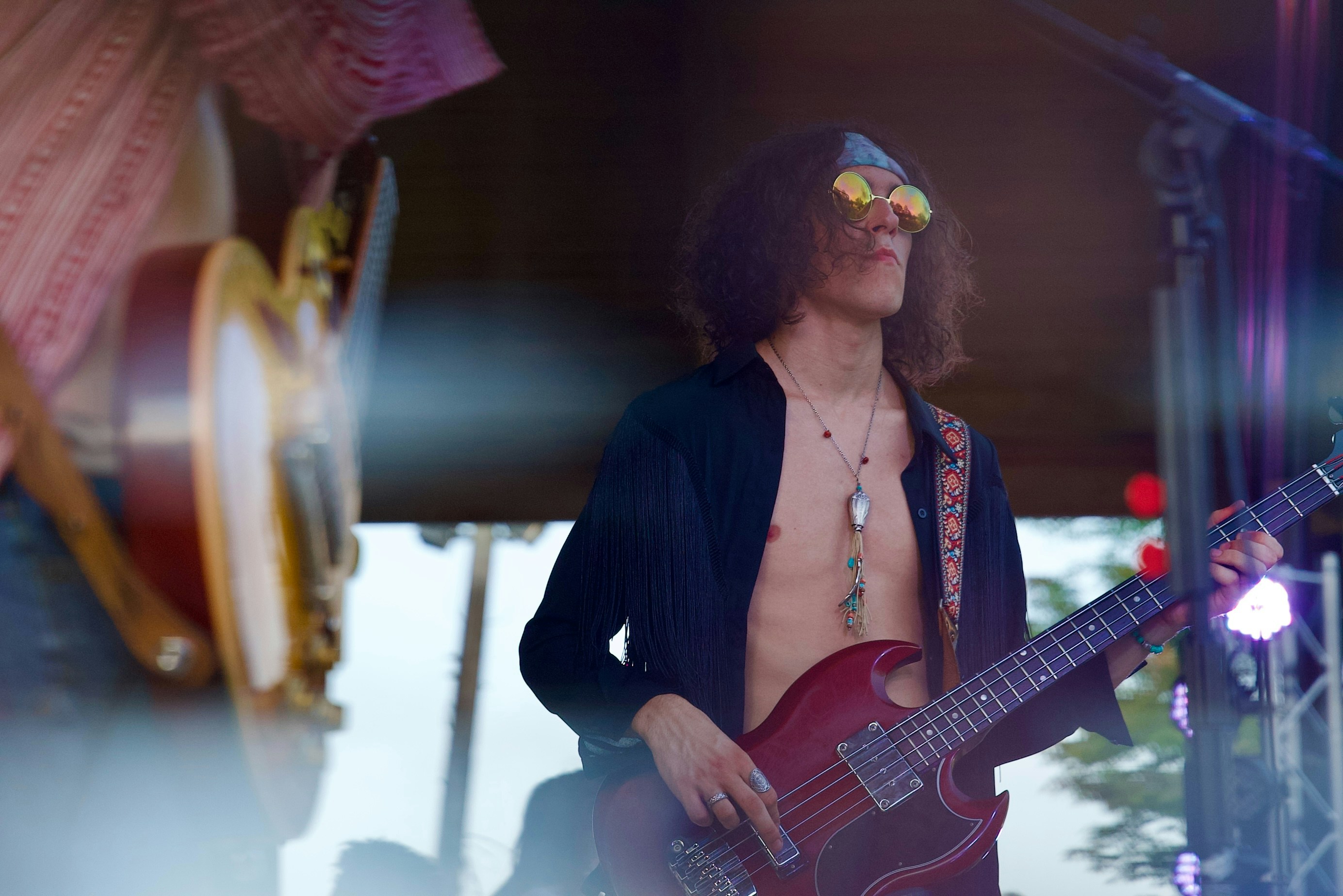 Bass guitarist performing on stage