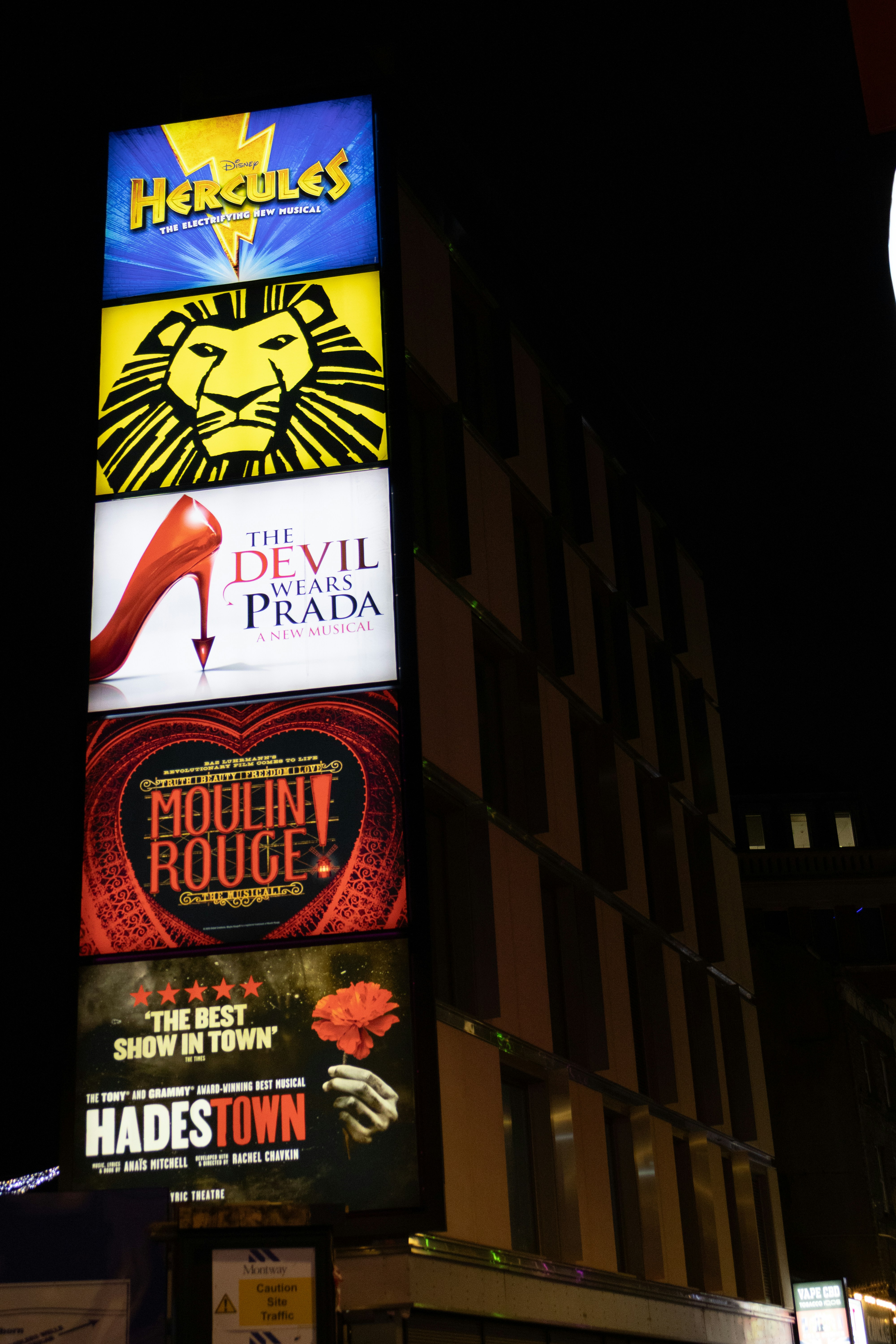 Broadway show posters light up the night sky