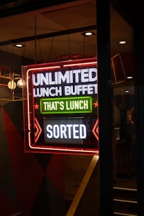 Neon sign advertises unlimited lunch buffet