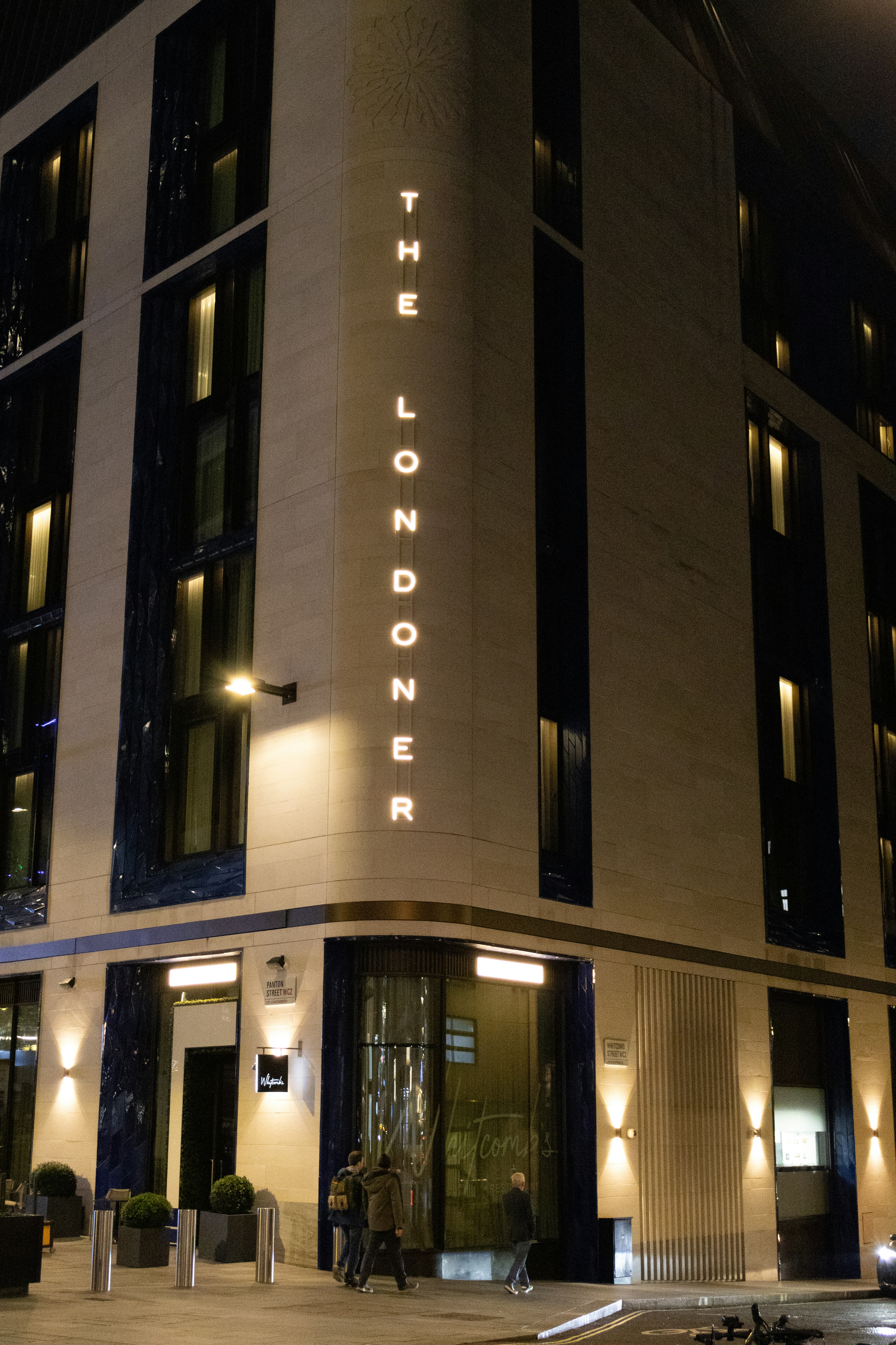 The londoner hotel illuminated at night
