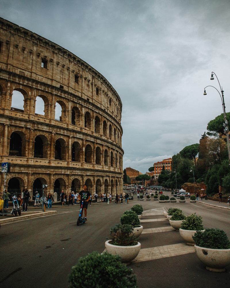 View of the Colosseum at sunrise from the Celio hill — the view from Colosseum Holidays apartments