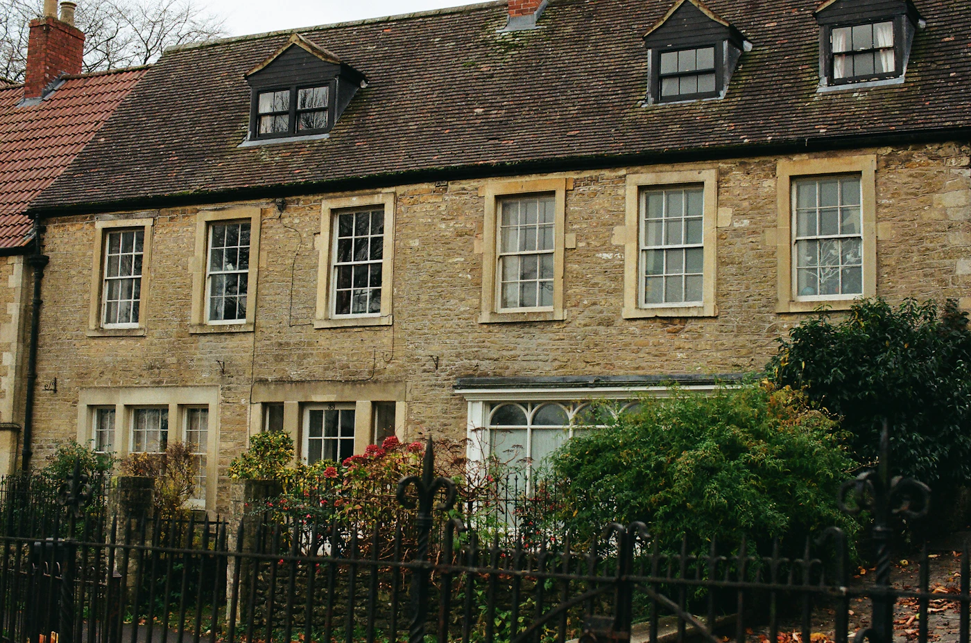 An old stone house with sash windows