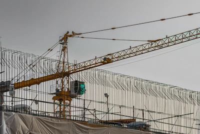 Construction crane against a cloudy sky