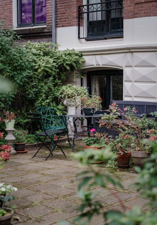 Garden patio with potted plants and outdoor seating