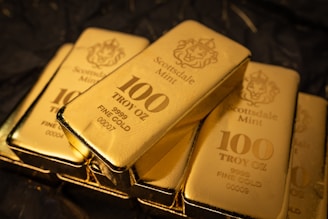 Stack of 100 troy ounce fine gold bars