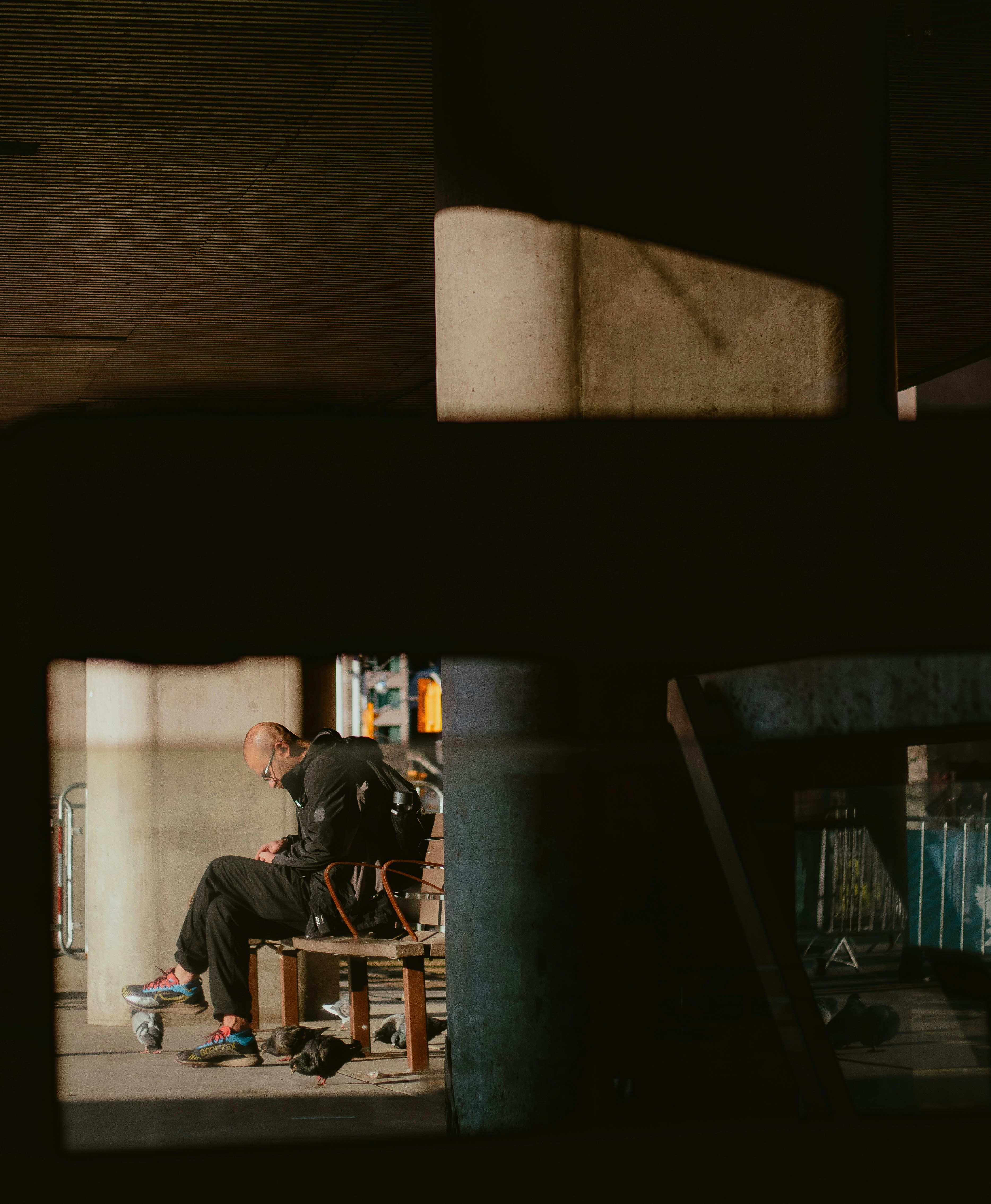 Man sitting on chair in workshop