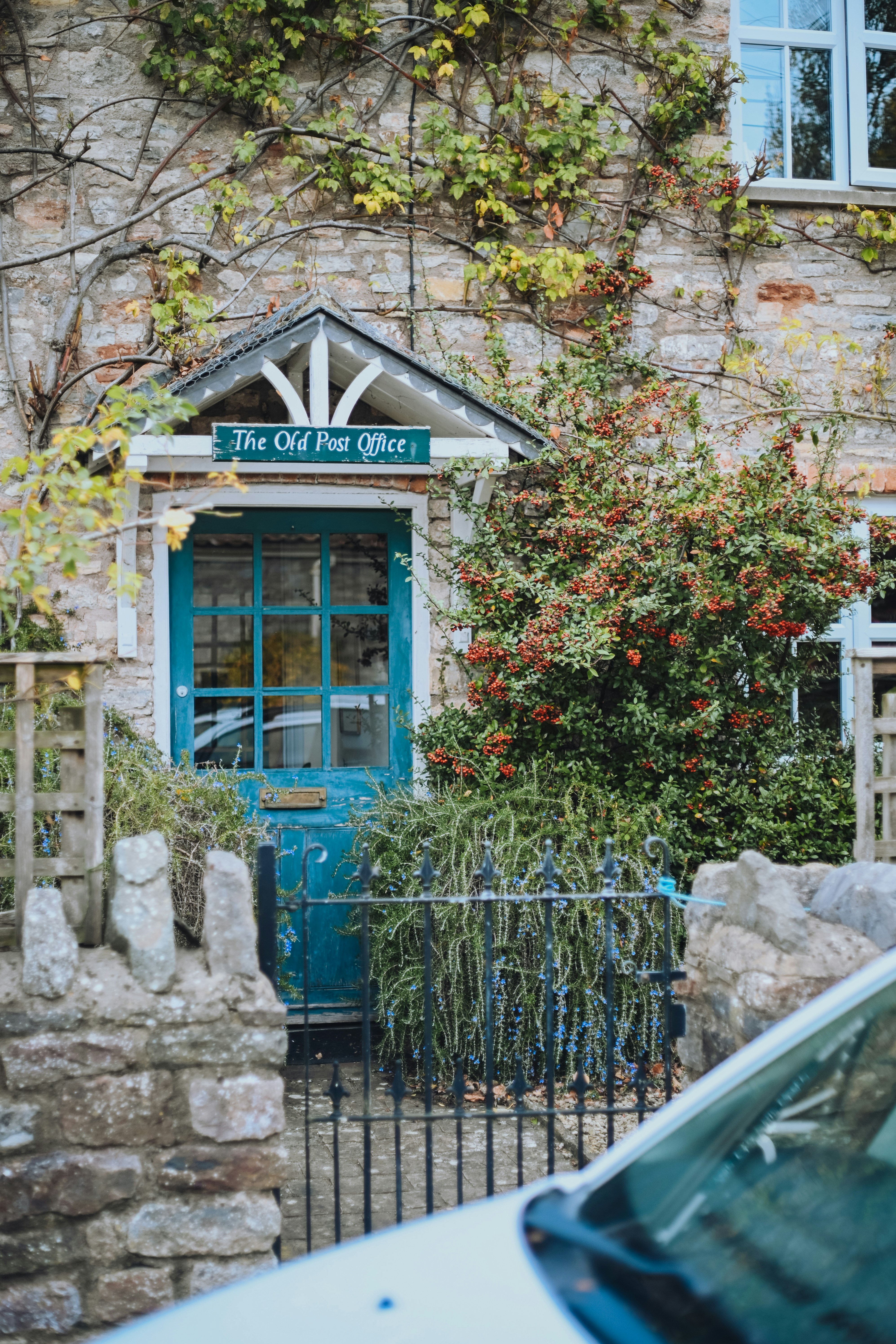 The old post office entrance with blue door.