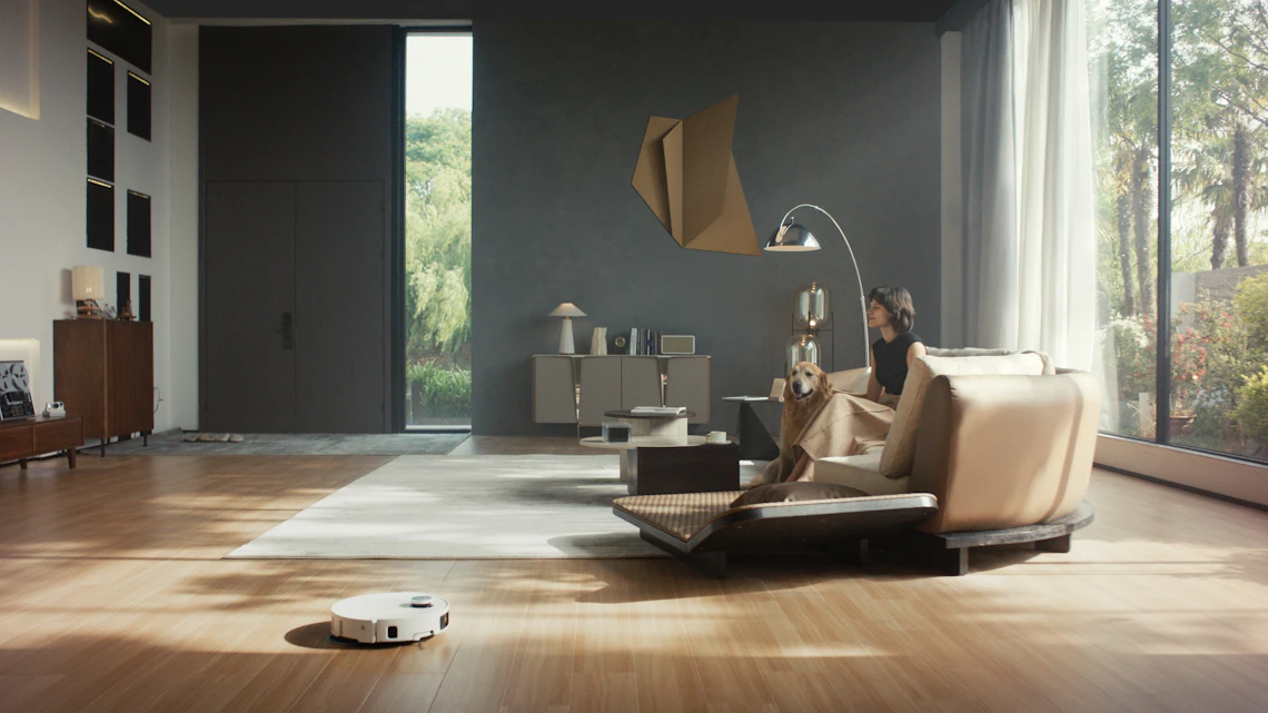 Robot vacuum cleaning a modern living room floor
