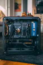 Open computer case with internal components visible