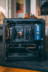 Open computer case with internal components visible