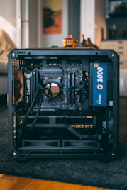 Open computer case with internal components visible