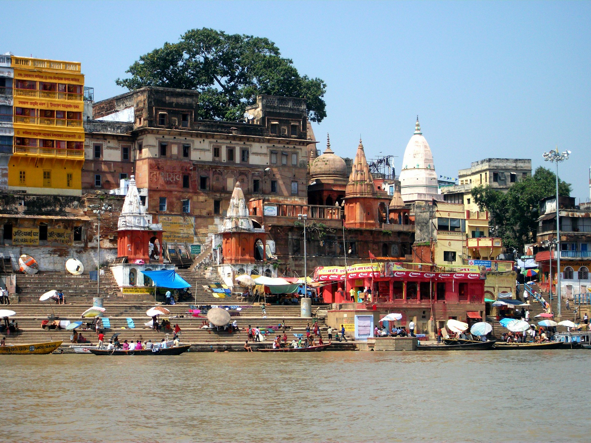 Ganges riverfront with buildings and boats