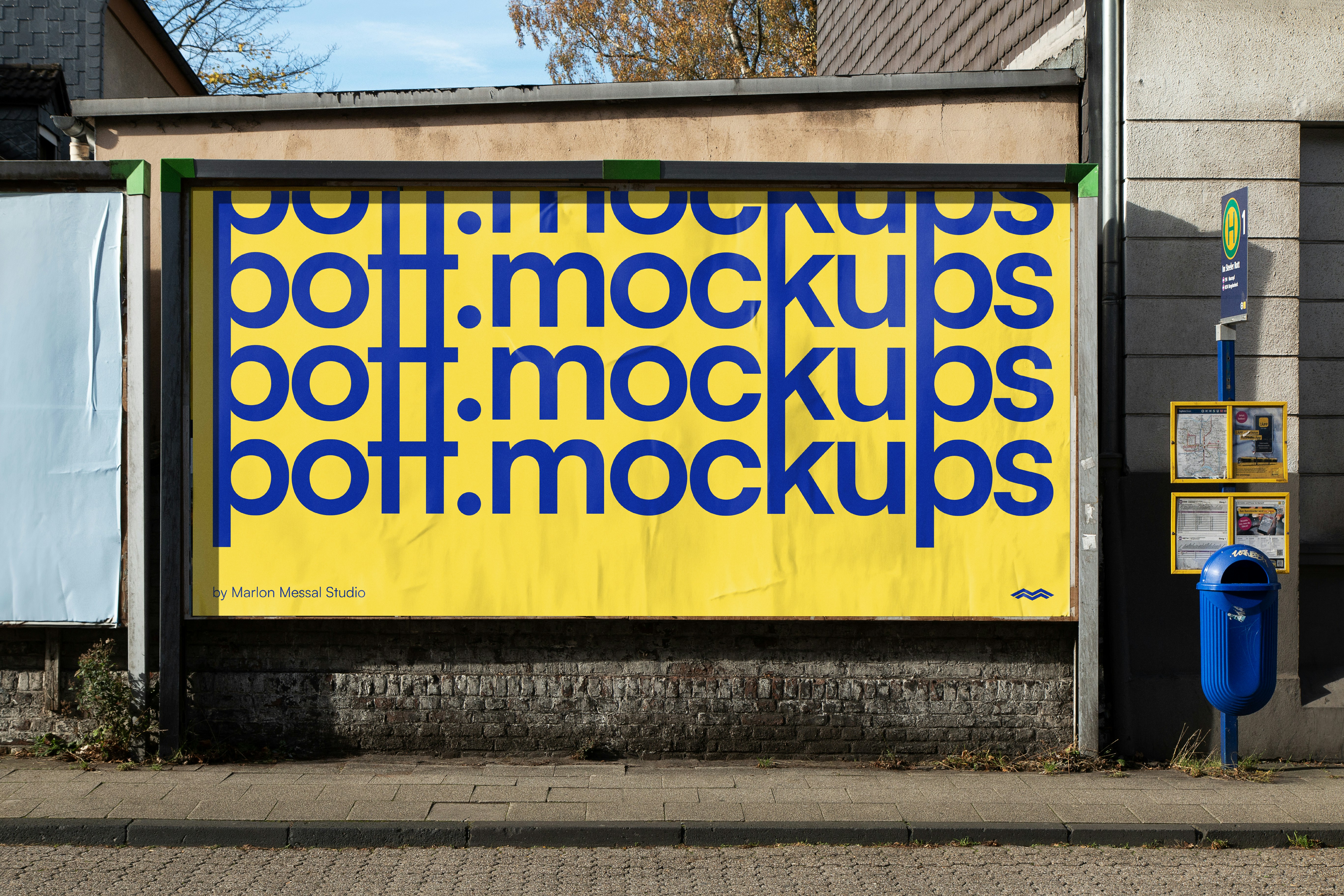 Yellow billboard with blue text repeating "boff.mockups" repeated