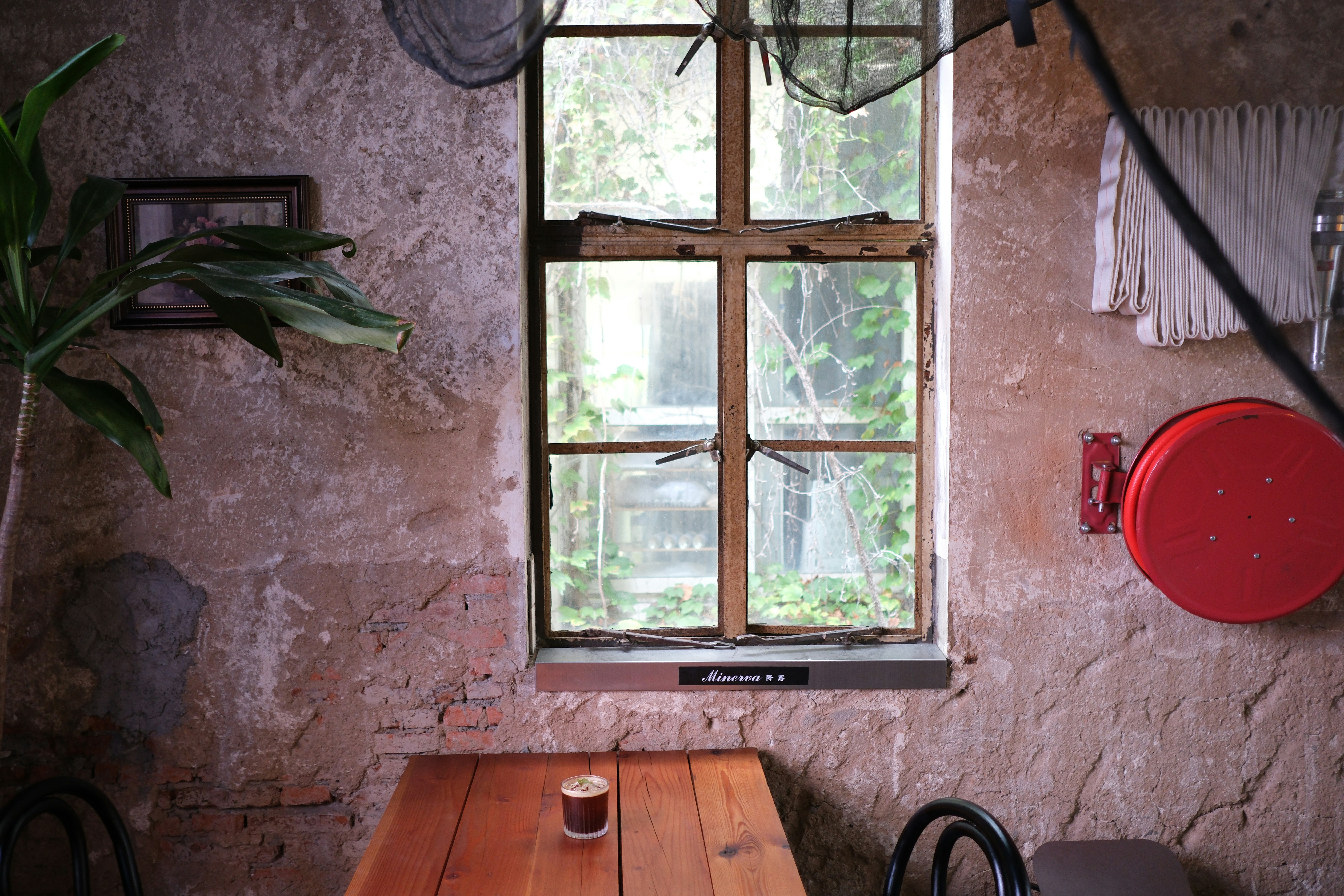 Rustic room with wooden table and window view through window