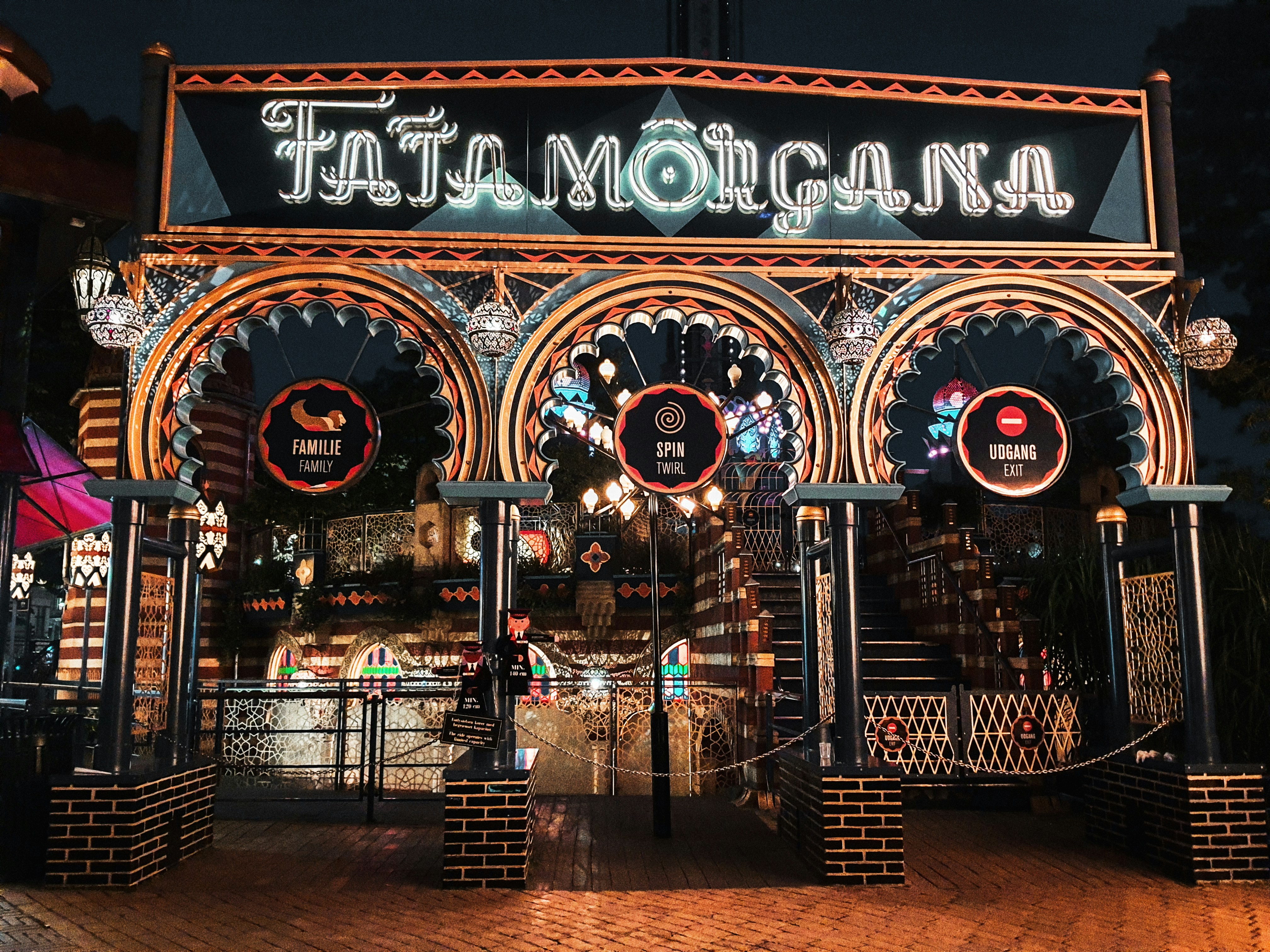 Ornate entrance to fata morgana at night