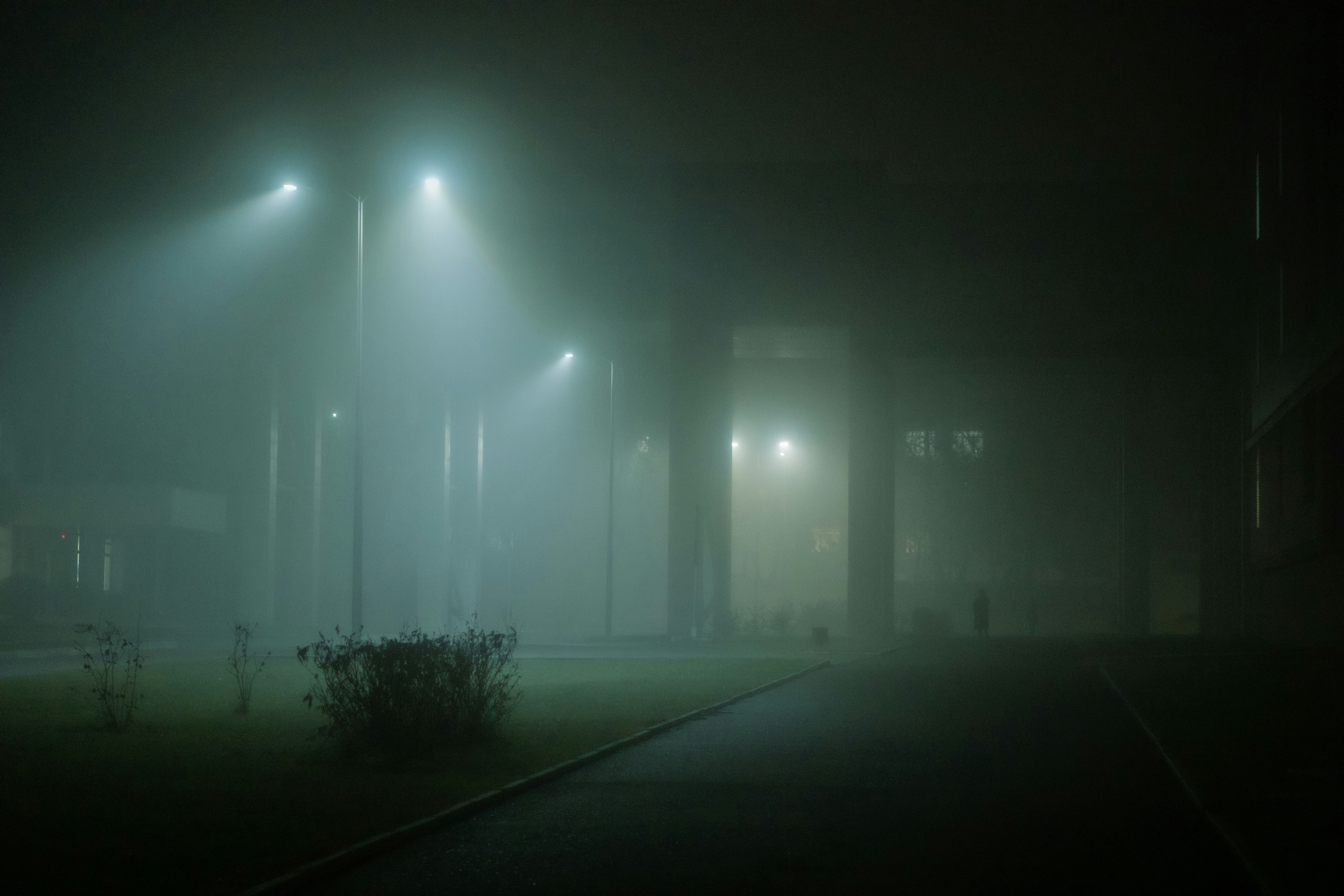 A cinematic shot of a single, crisp beam of light cutting through a dark, hazy space, symbolizing the clarity of a 'signal' found within market noise.