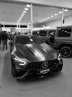 Matte black mercedes-benz gt sedan on display