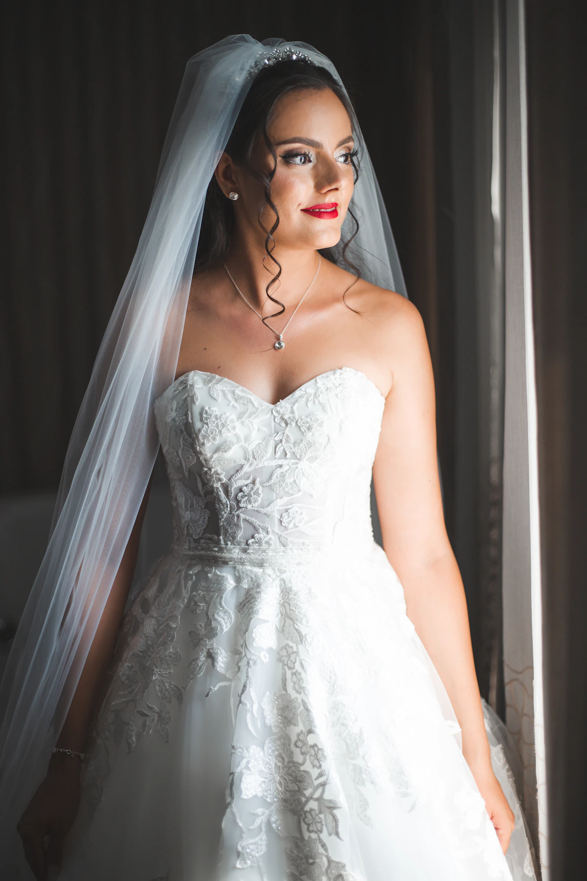 Bride wearing elegant Chloe Dress wedding gown