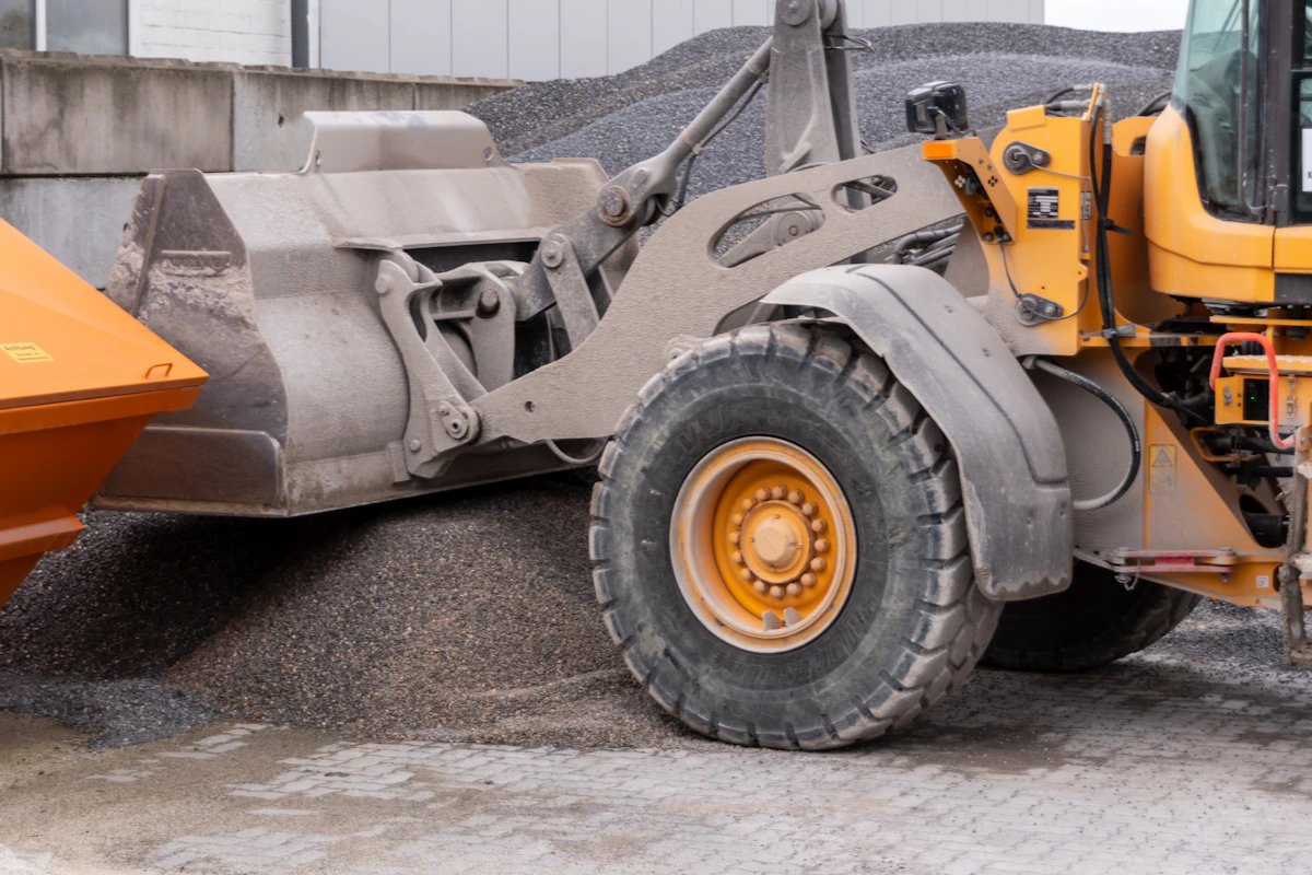 Loader working a material stockpile