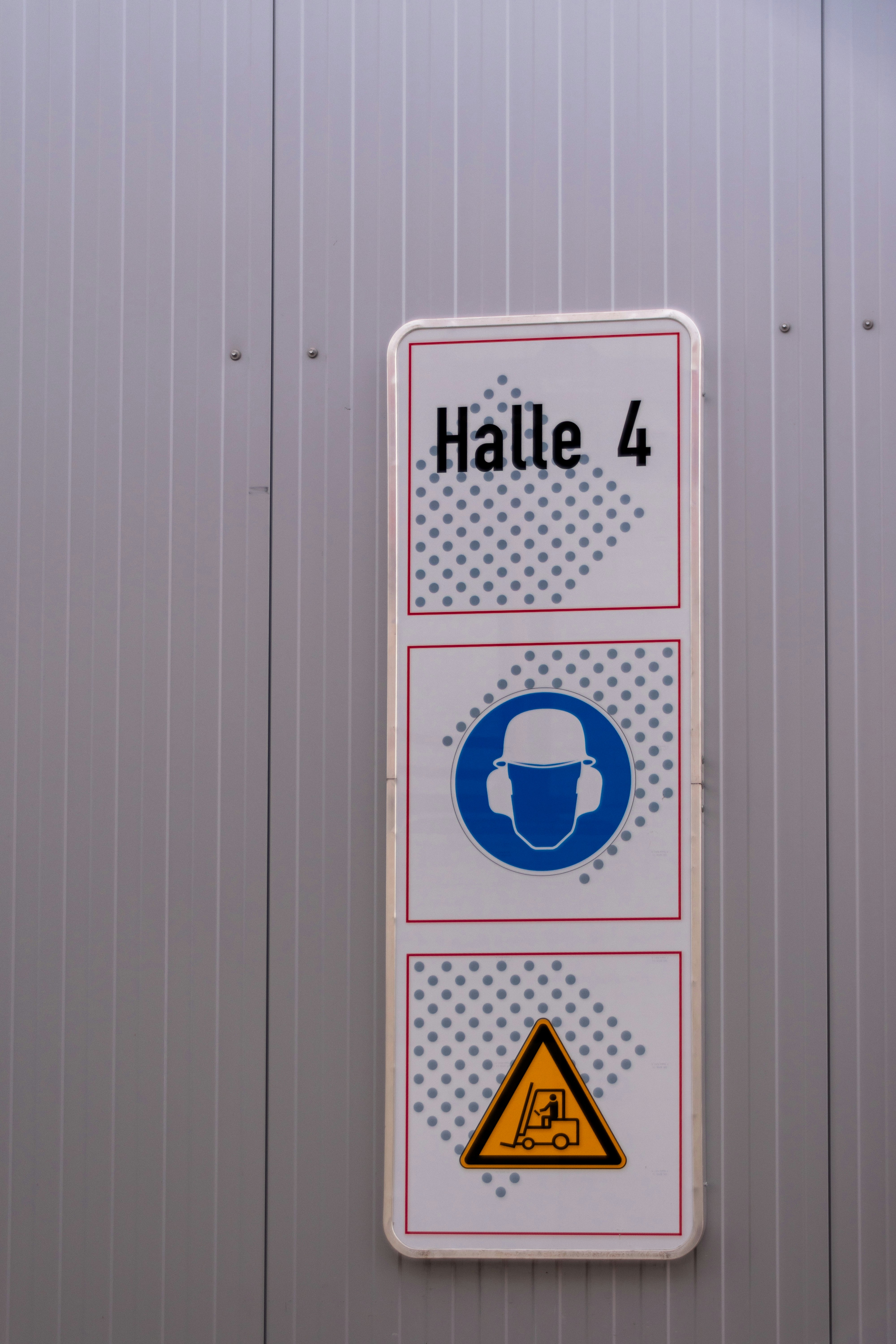 Sign for hall 4 with safety warnings