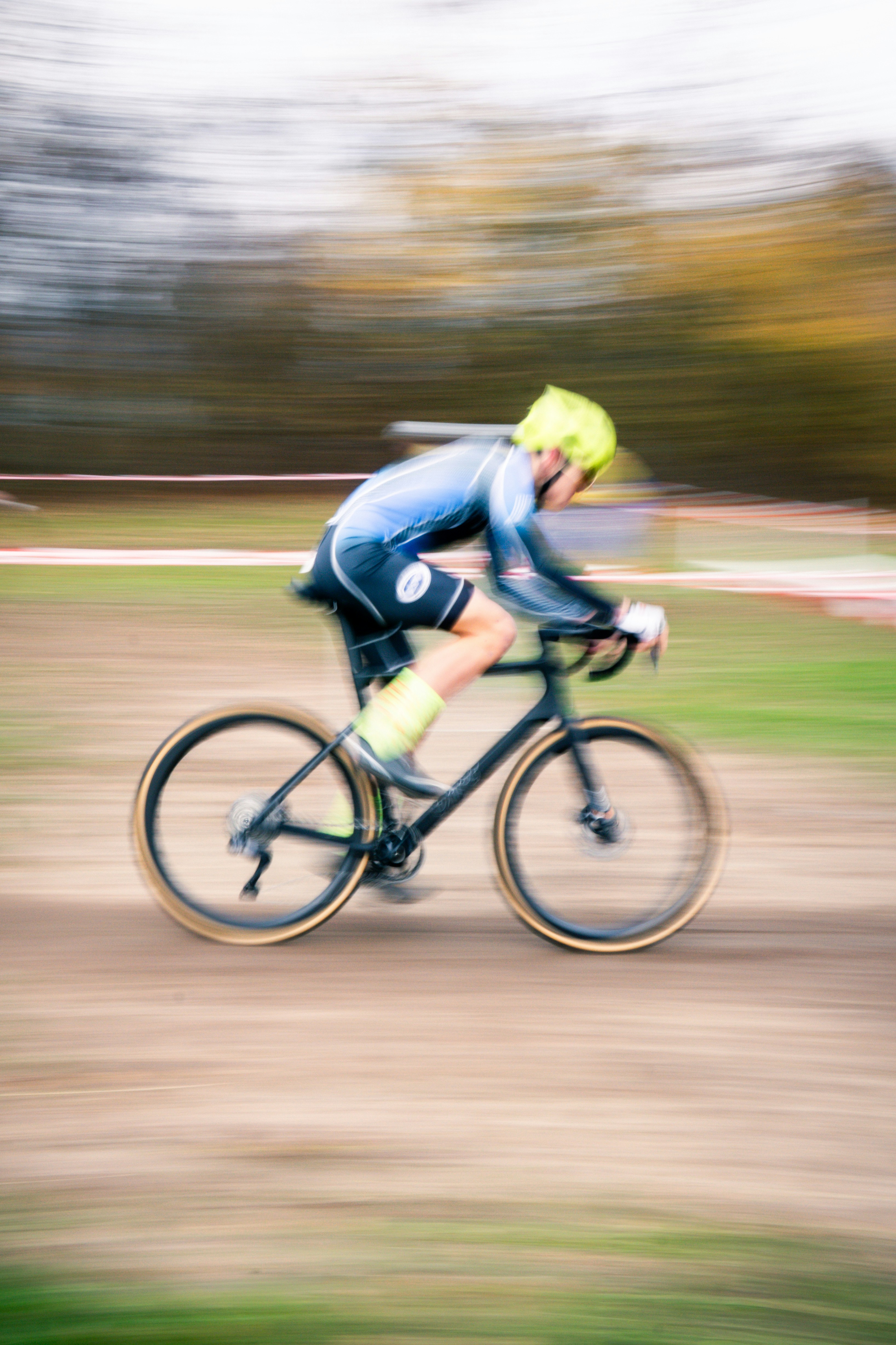 Cyclist in motion on a dirt track