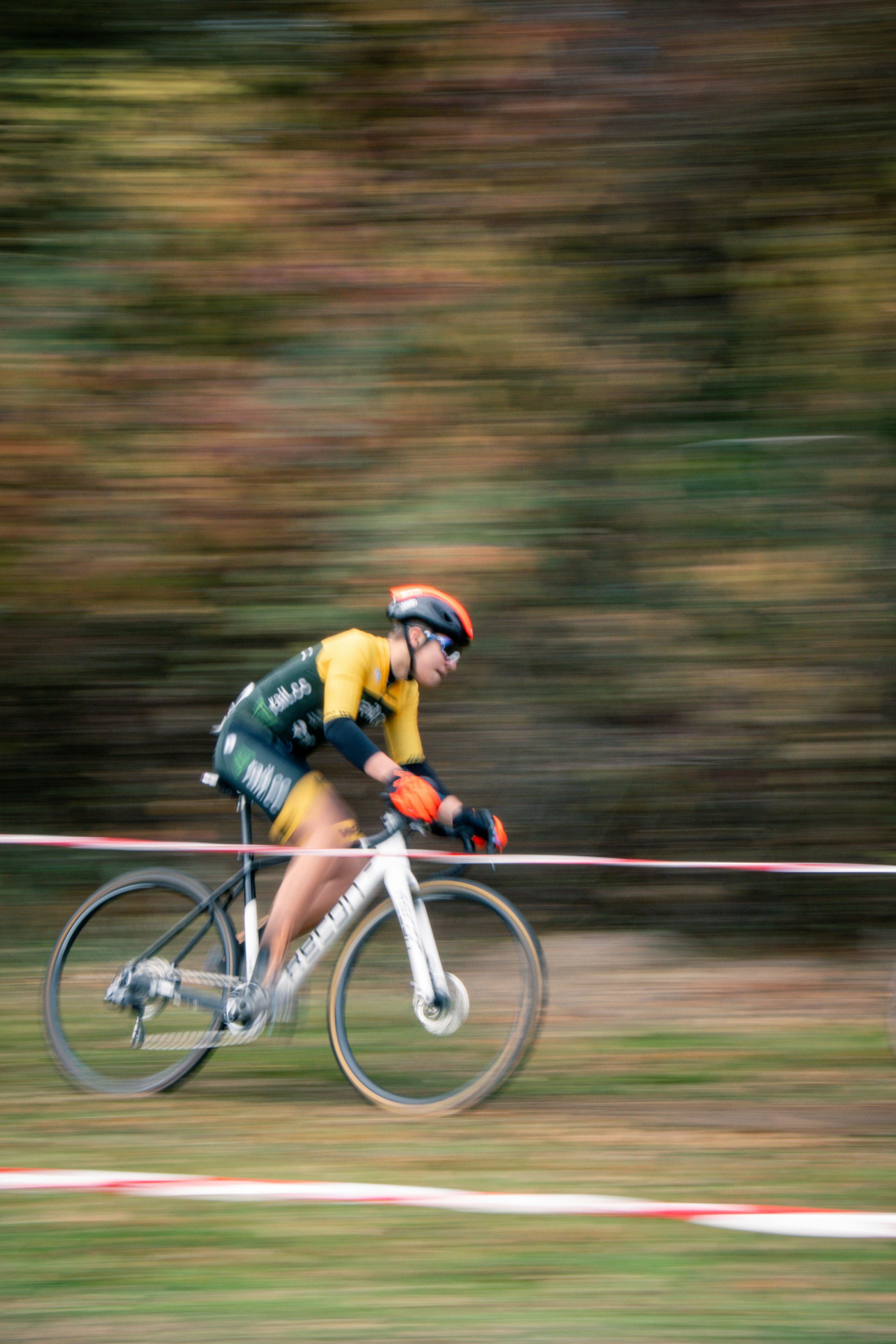 Cyclist racing on a blurred background