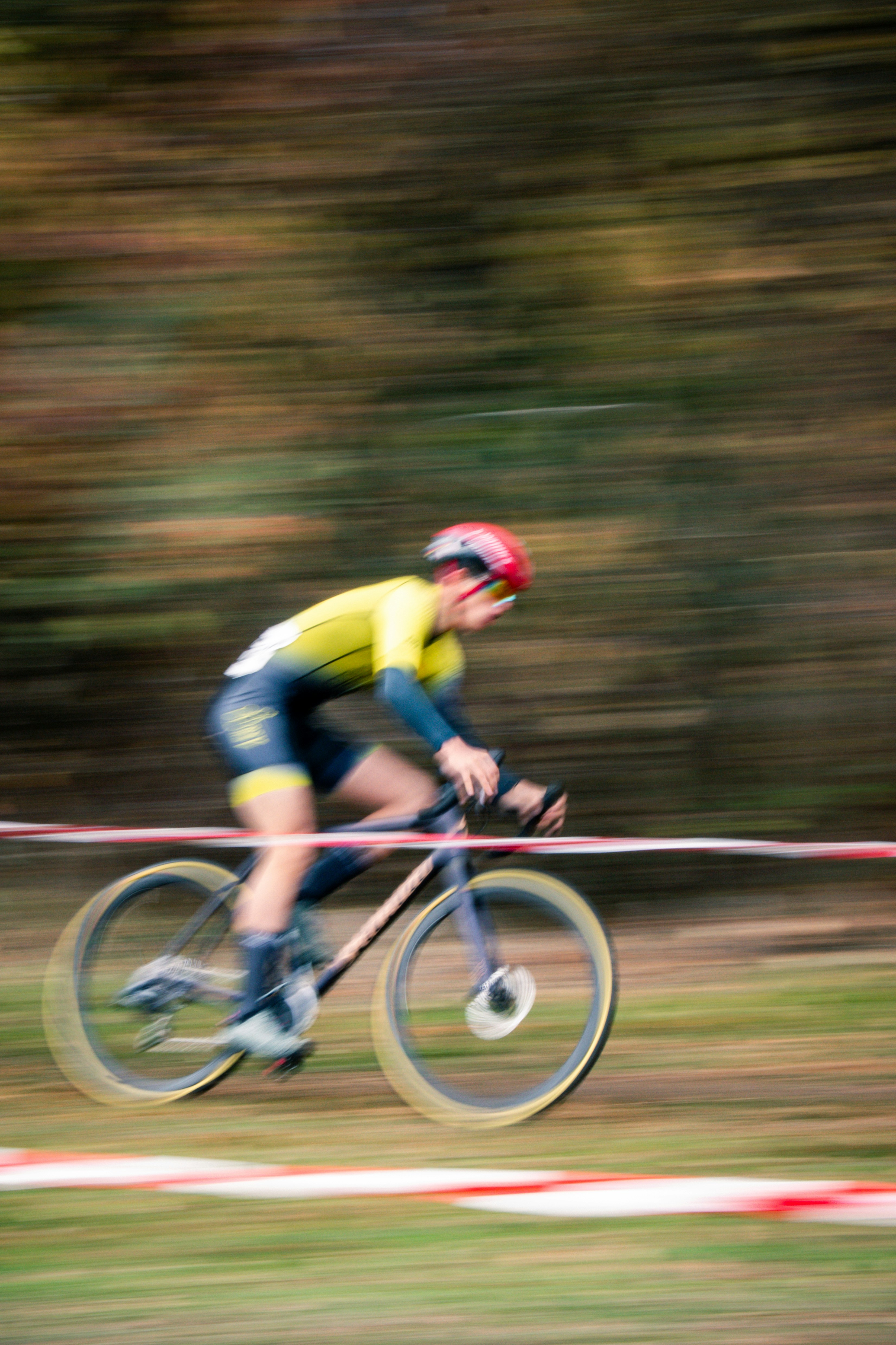 Cyclist in motion on a dirt path