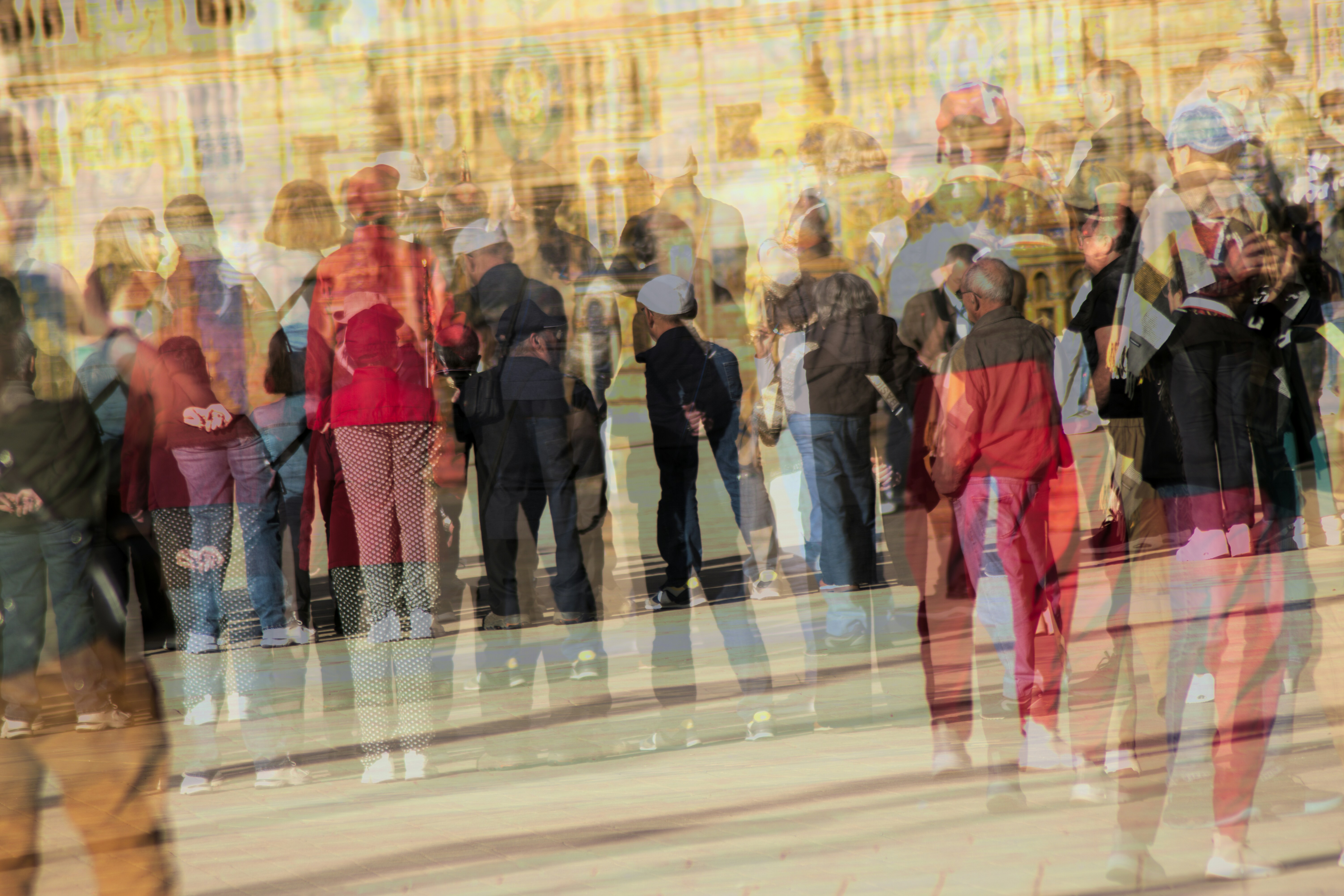 Abstract depiction of a crowd with blurred figures.