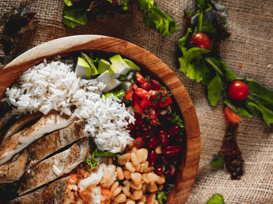 Balanced prepared meal with chicken, rice and vegetables