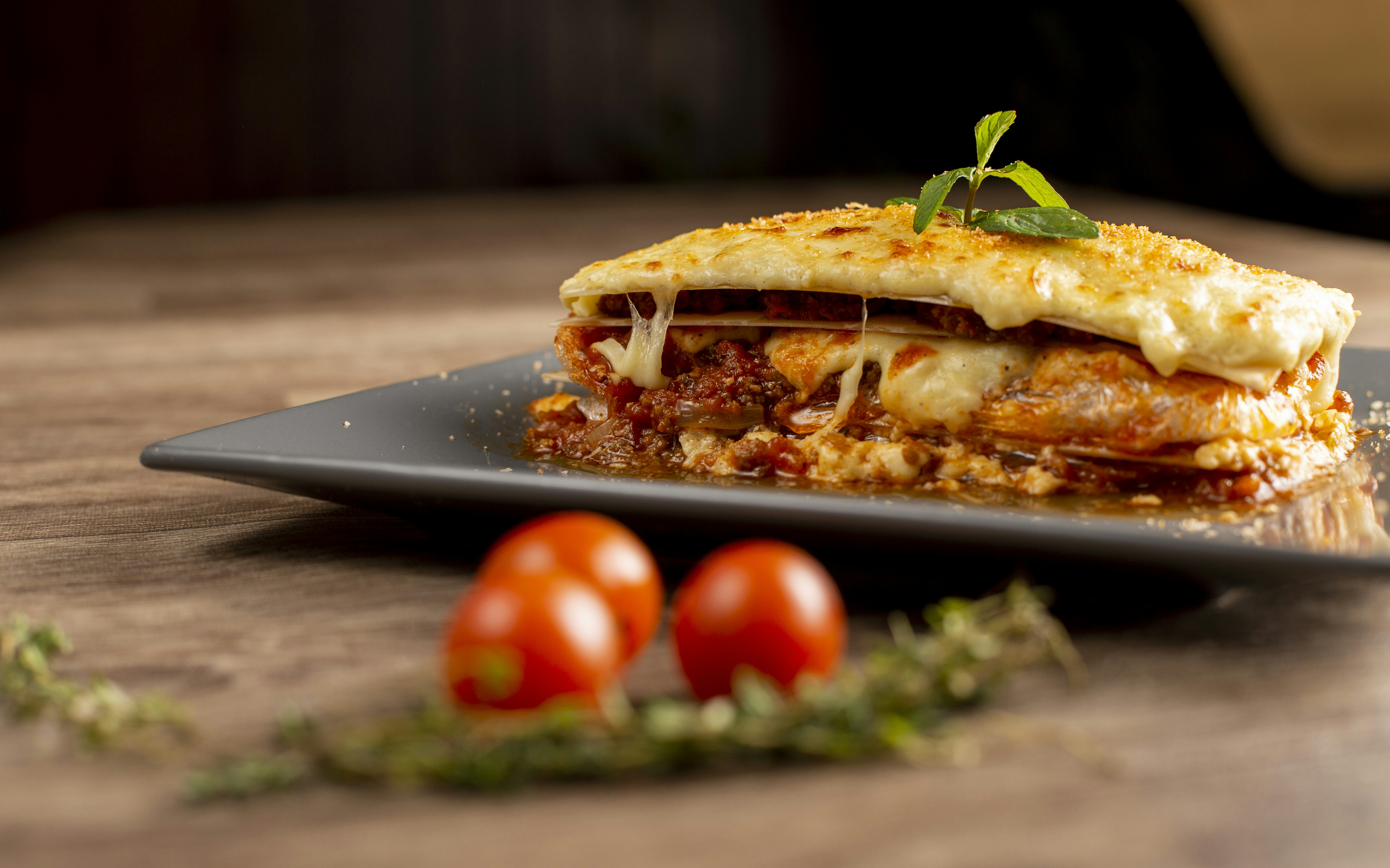 A delicious slice of lasagna with melted cheese