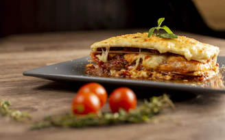 A delicious slice of lasagna with melted cheese