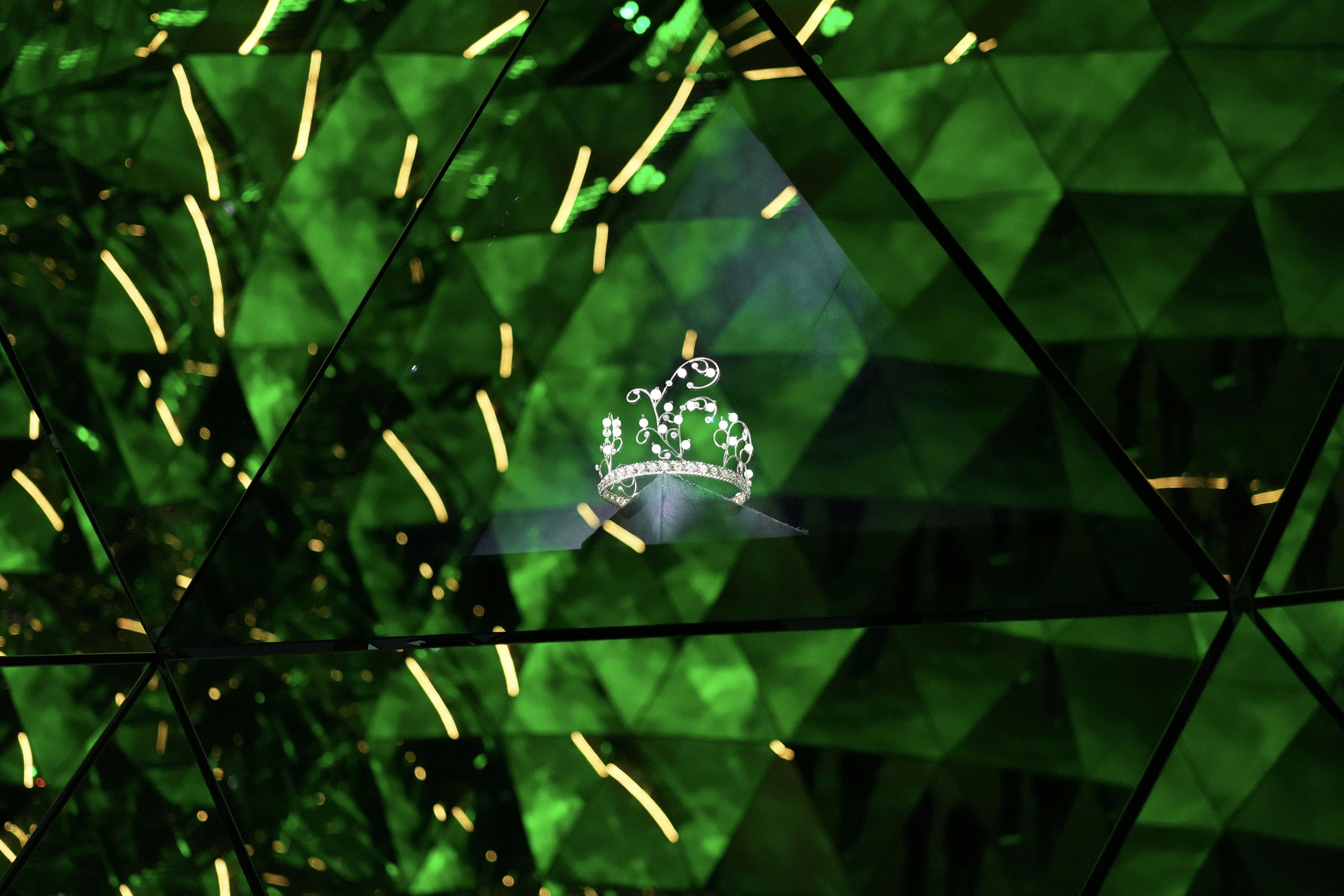 Green geometric pattern with a crown